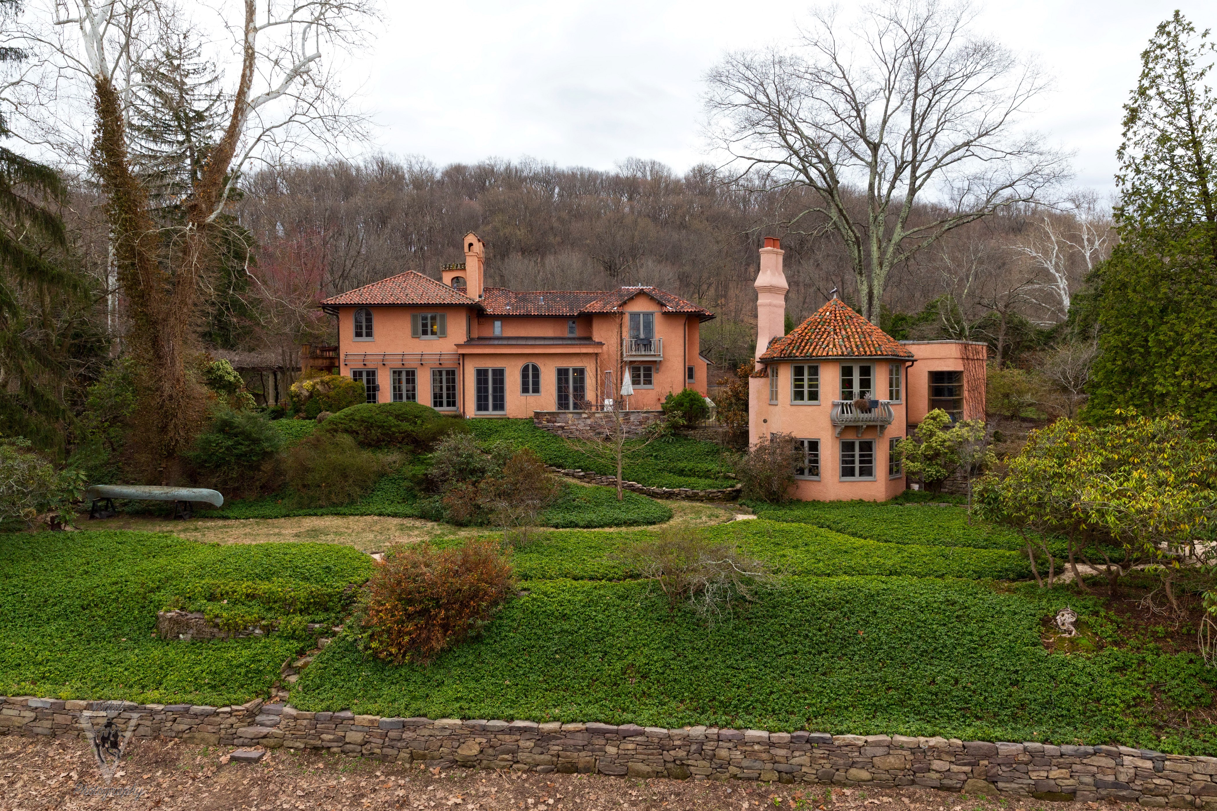 Orange Mansion with Terracotta Roof and Green Landscaping HD Wallpaper