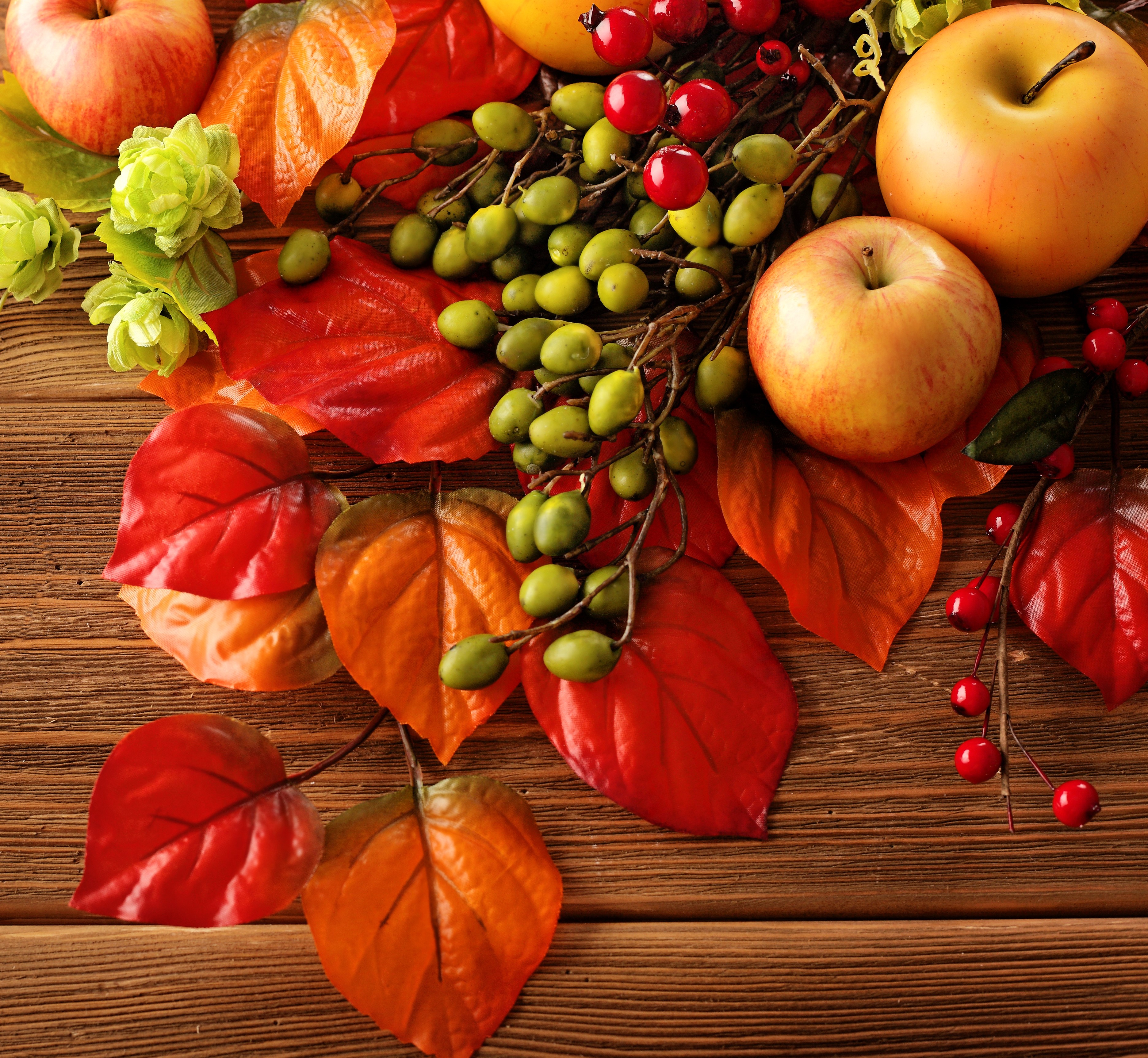 Autumn harvest with apples, berries, and leaves HD Wallpaper