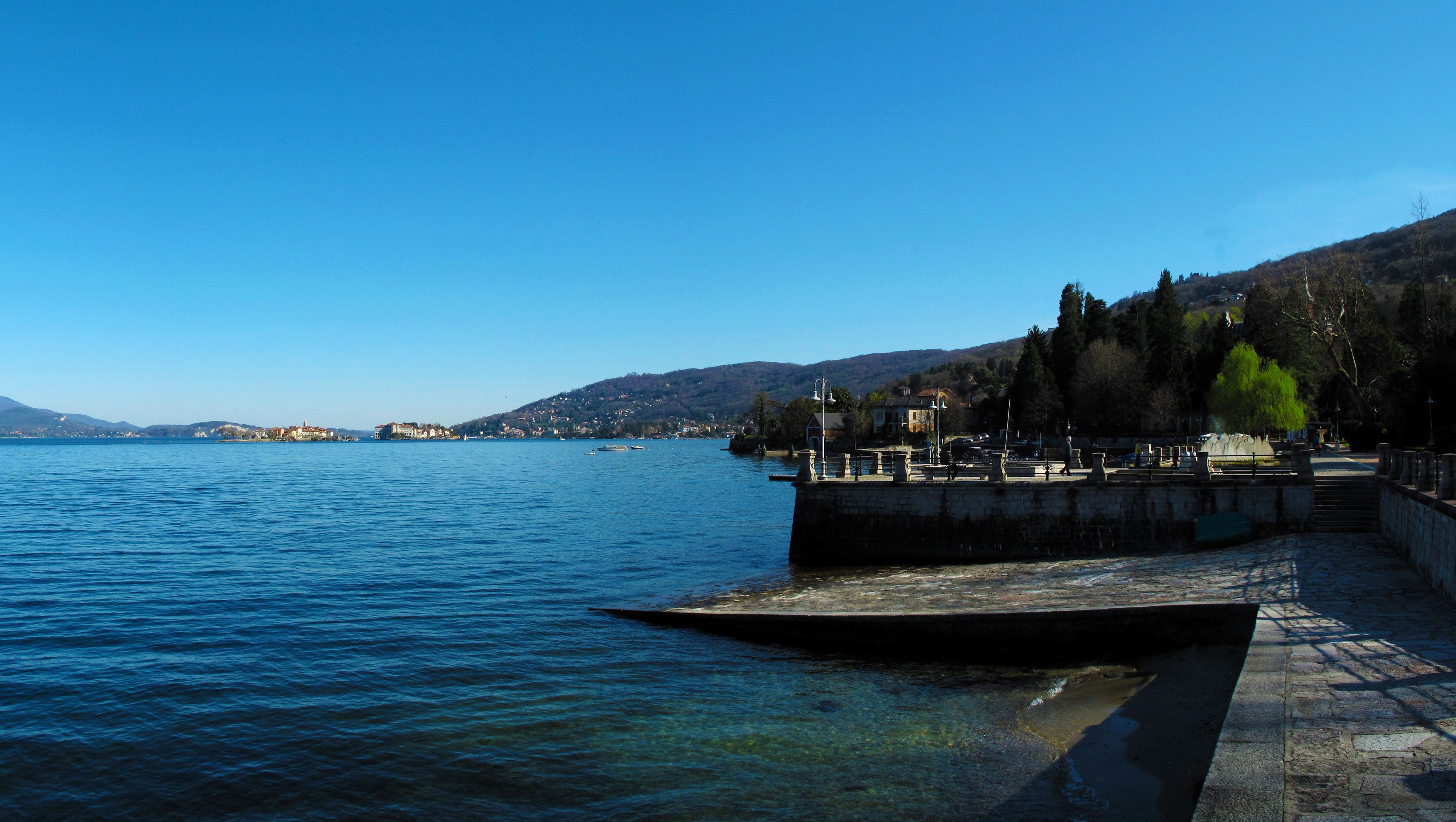 Lake Maggiore with islands and Baveno shoreline HD Wallpaper