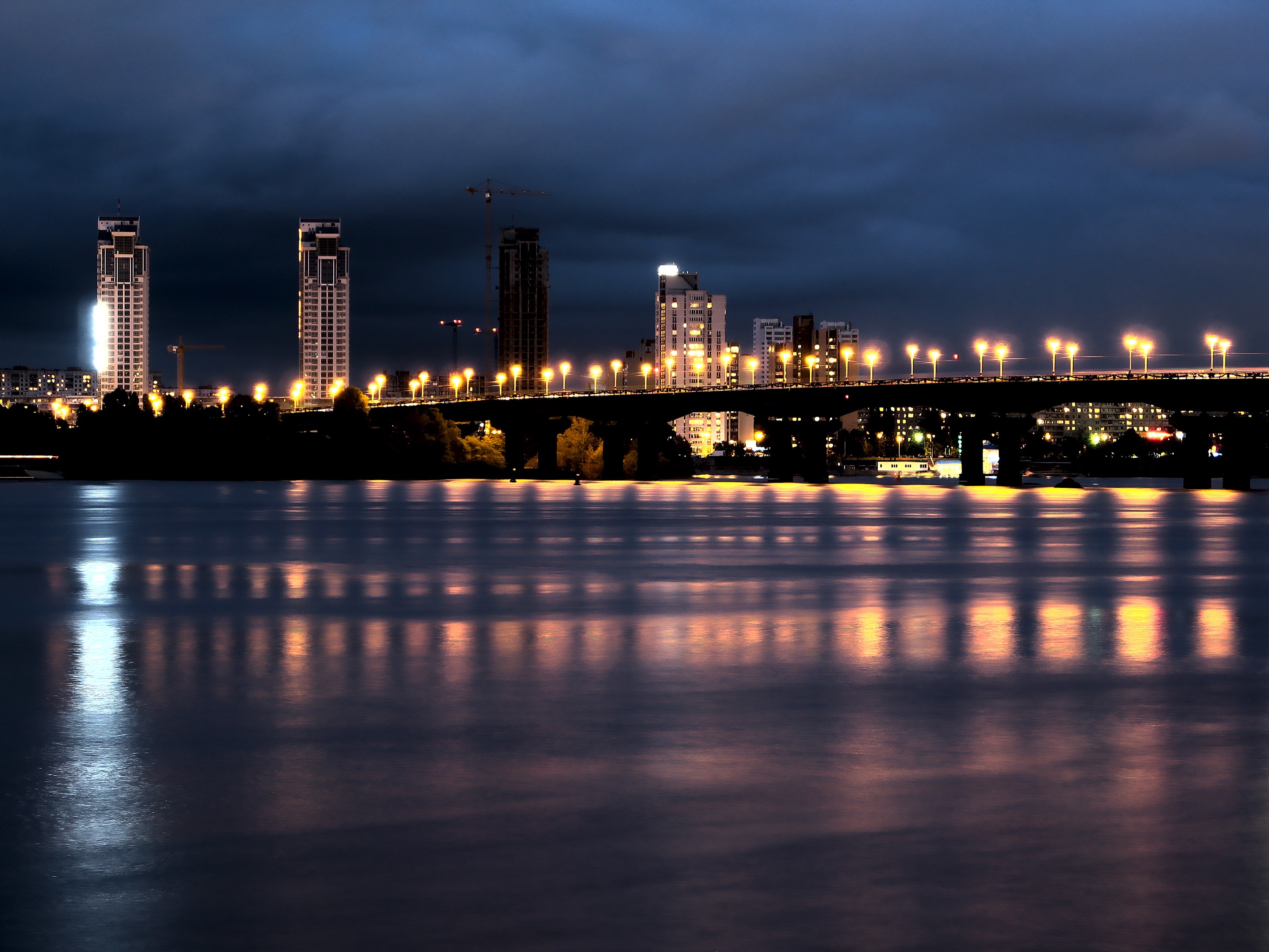 City skyline with bridge and river at night HD Wallpaper