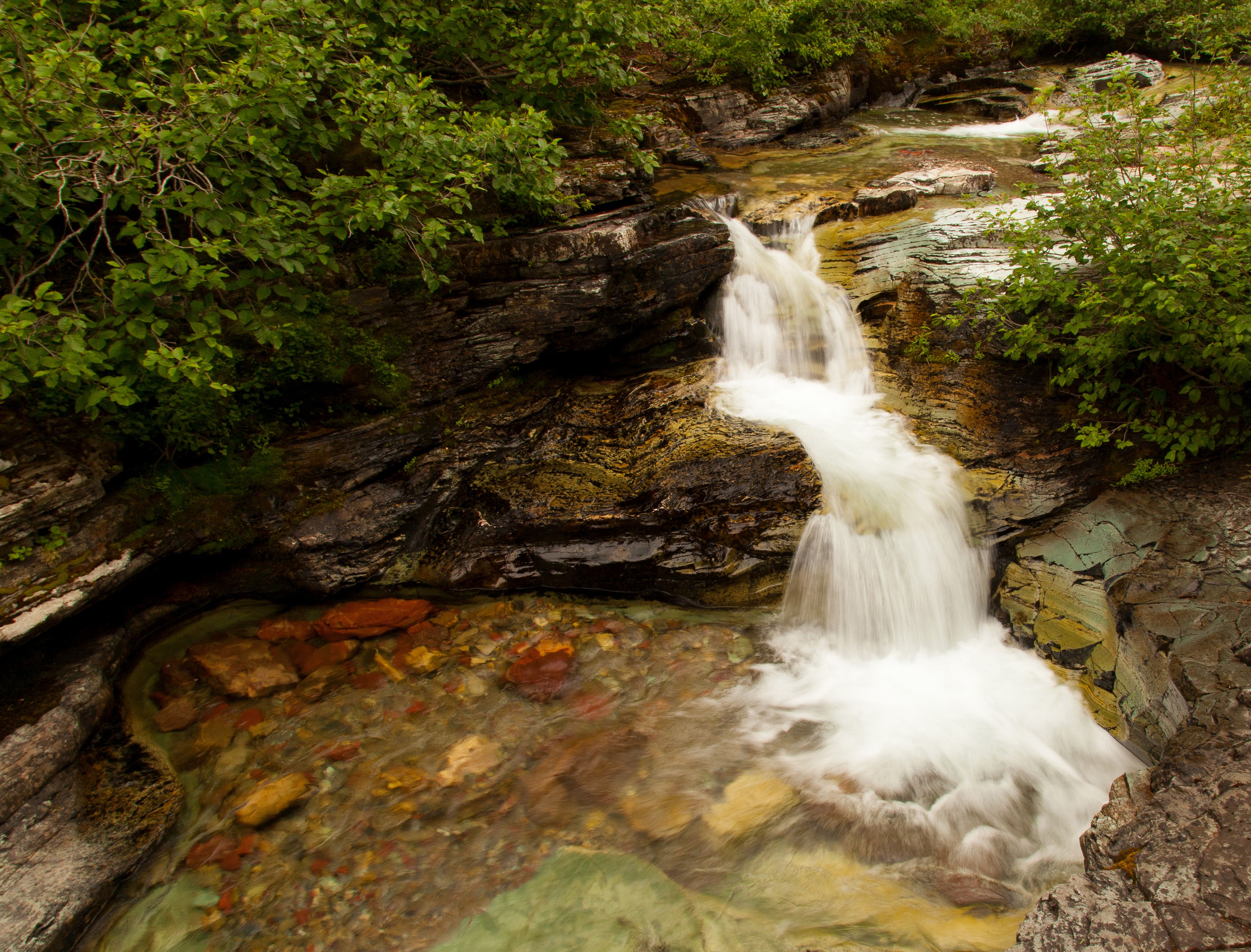 Waterfall in Glacier National Park, USA HD Wallpaper