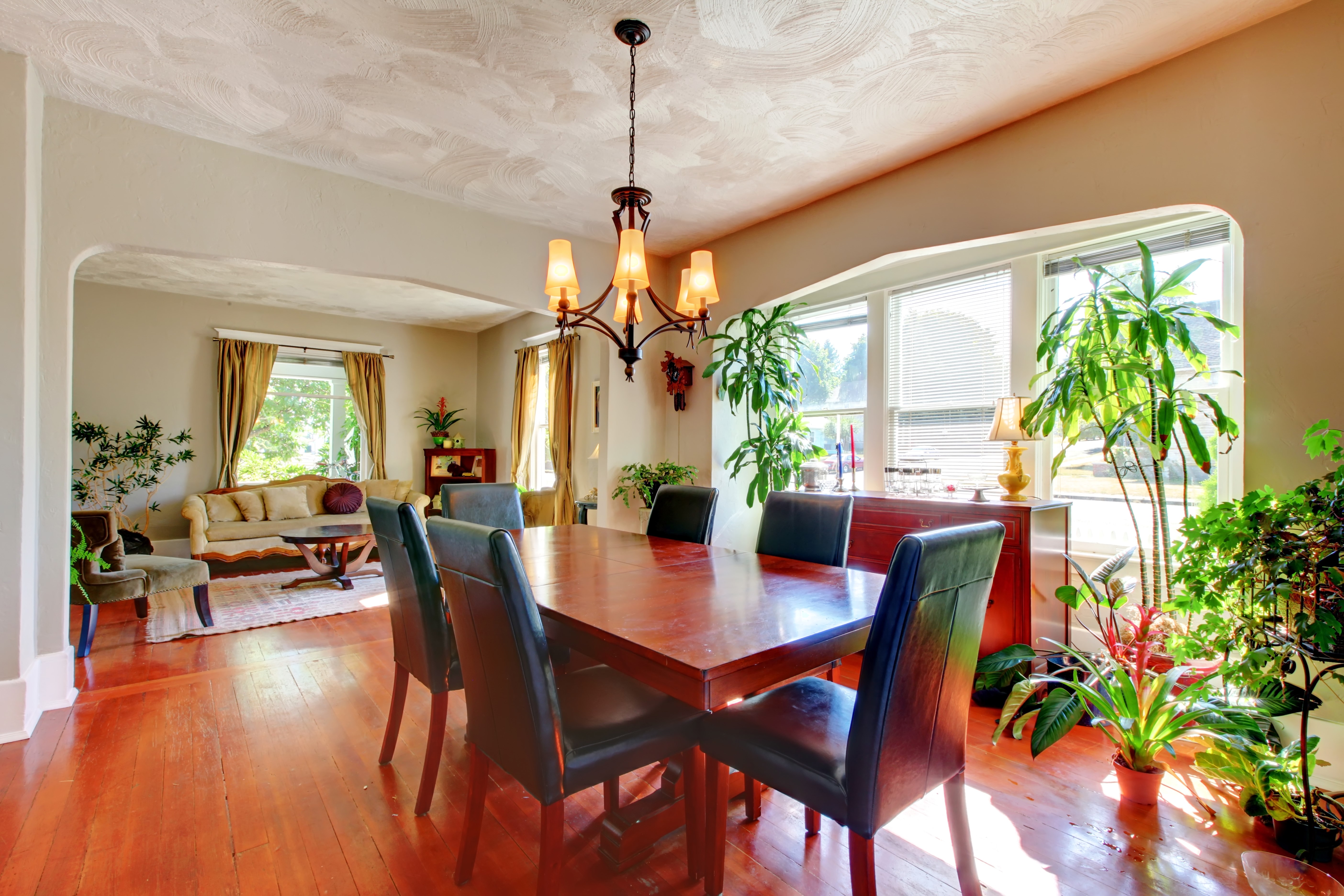 Dining room with table, chairs, and chandelier HD Wallpaper