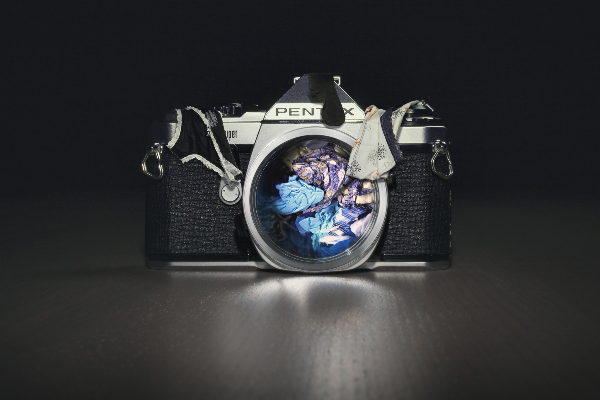 Pentax camera with laundry inside HD Wallpaper