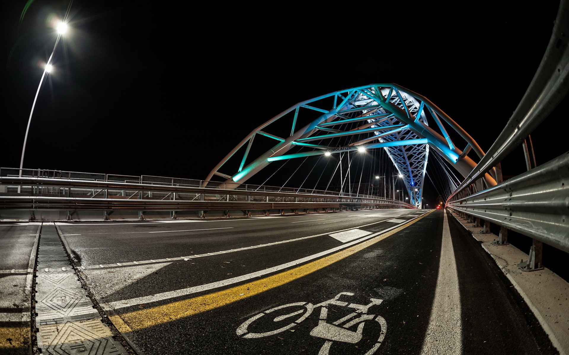 Night view of a modern bridge with colorful lights HD Wallpaper