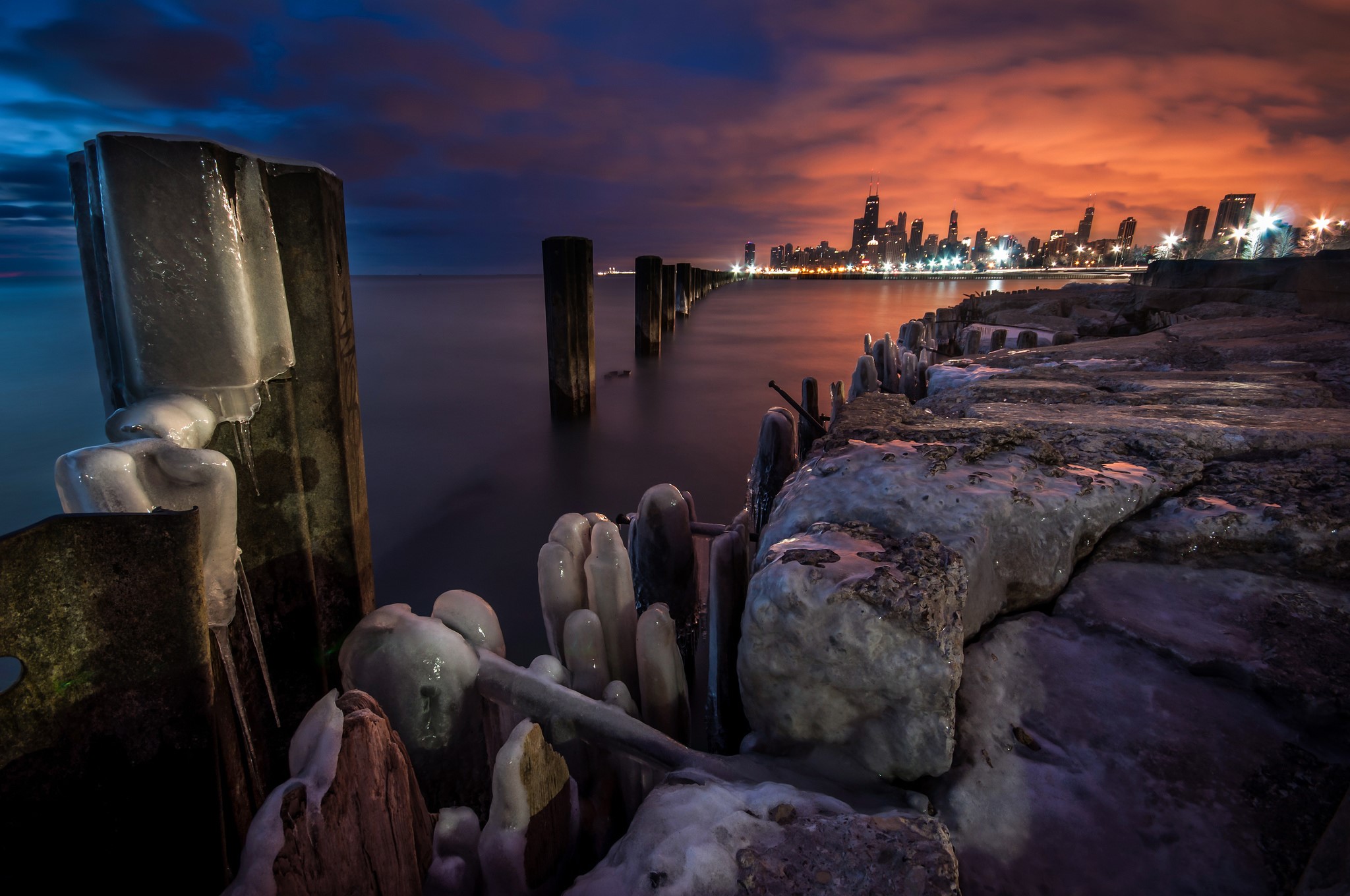 Chicago city skyline at dusk with icy lakefront HD Wallpaper