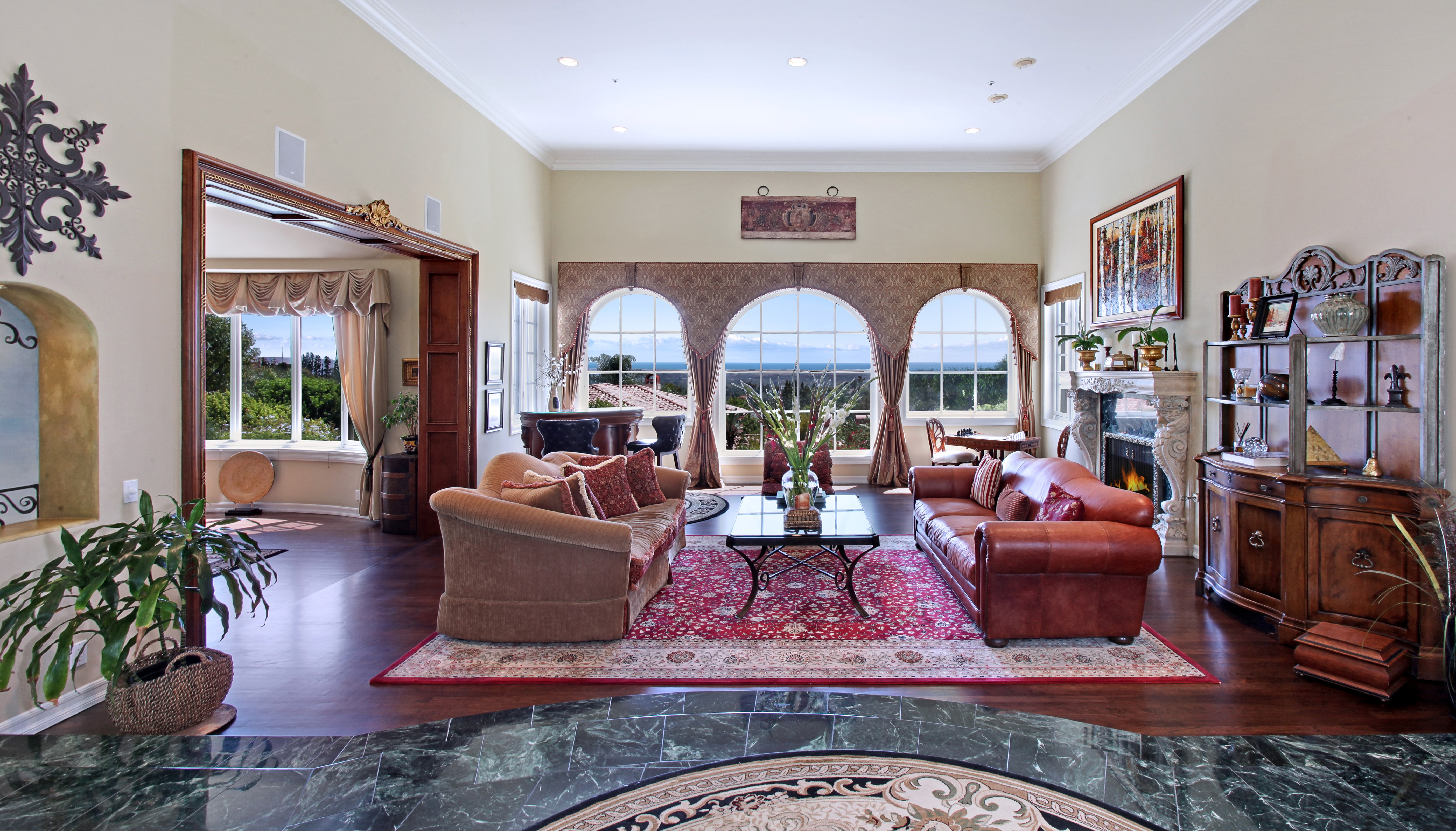 Living room with sofas and arched windows HD Wallpaper