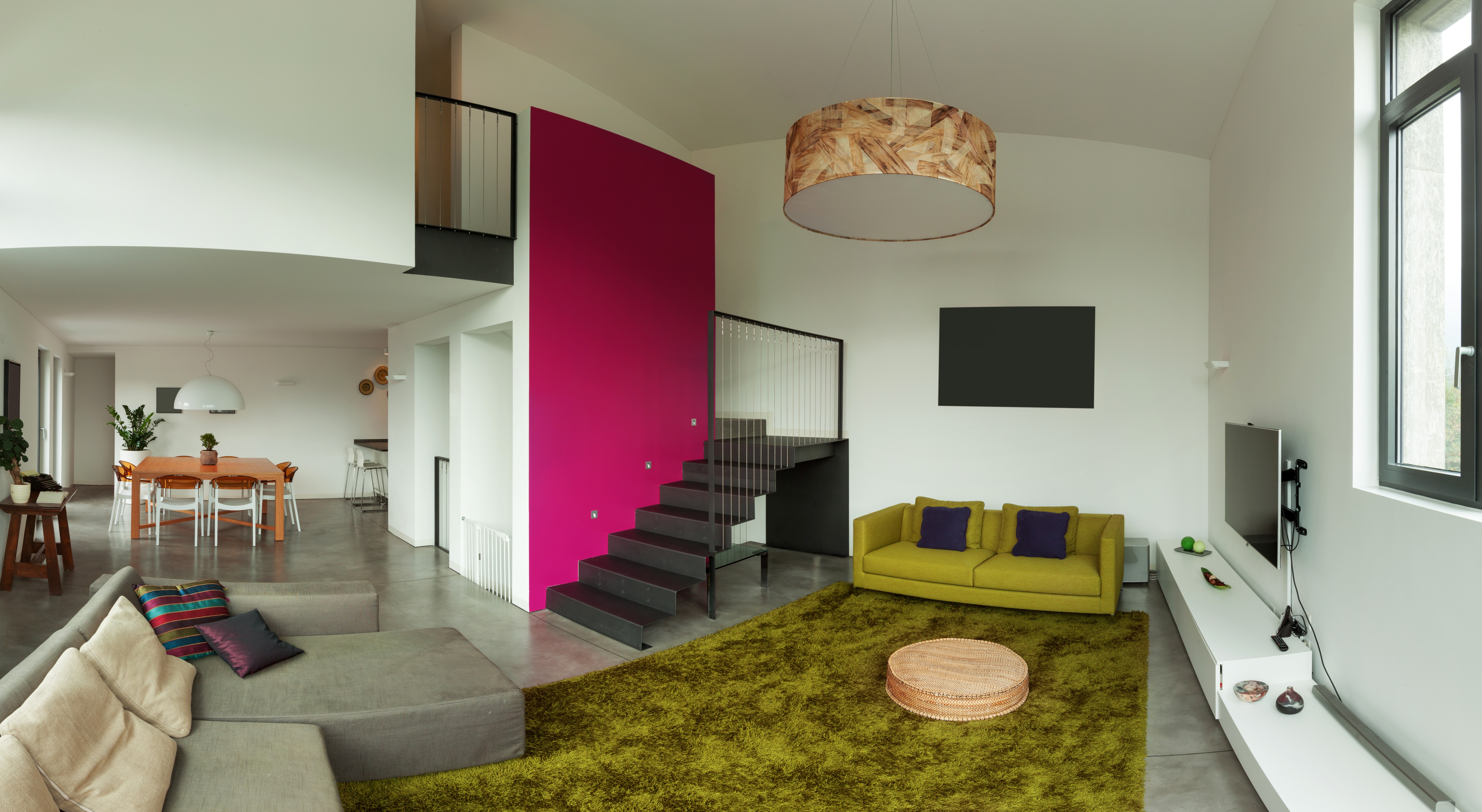 Modern living room with stairs and dining area HD Wallpaper