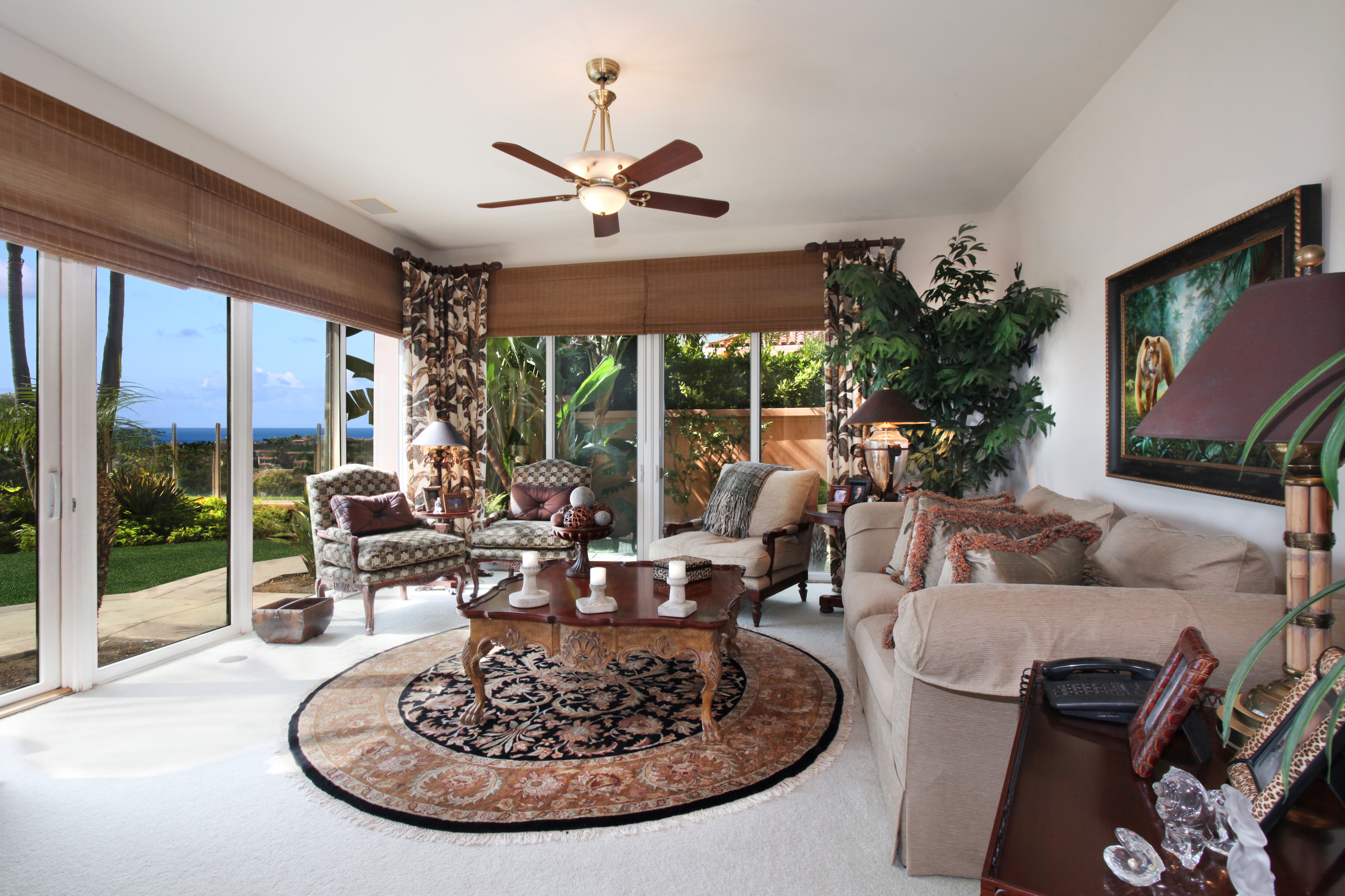 Living room with armchair, sofa, and coffee table HD Wallpaper