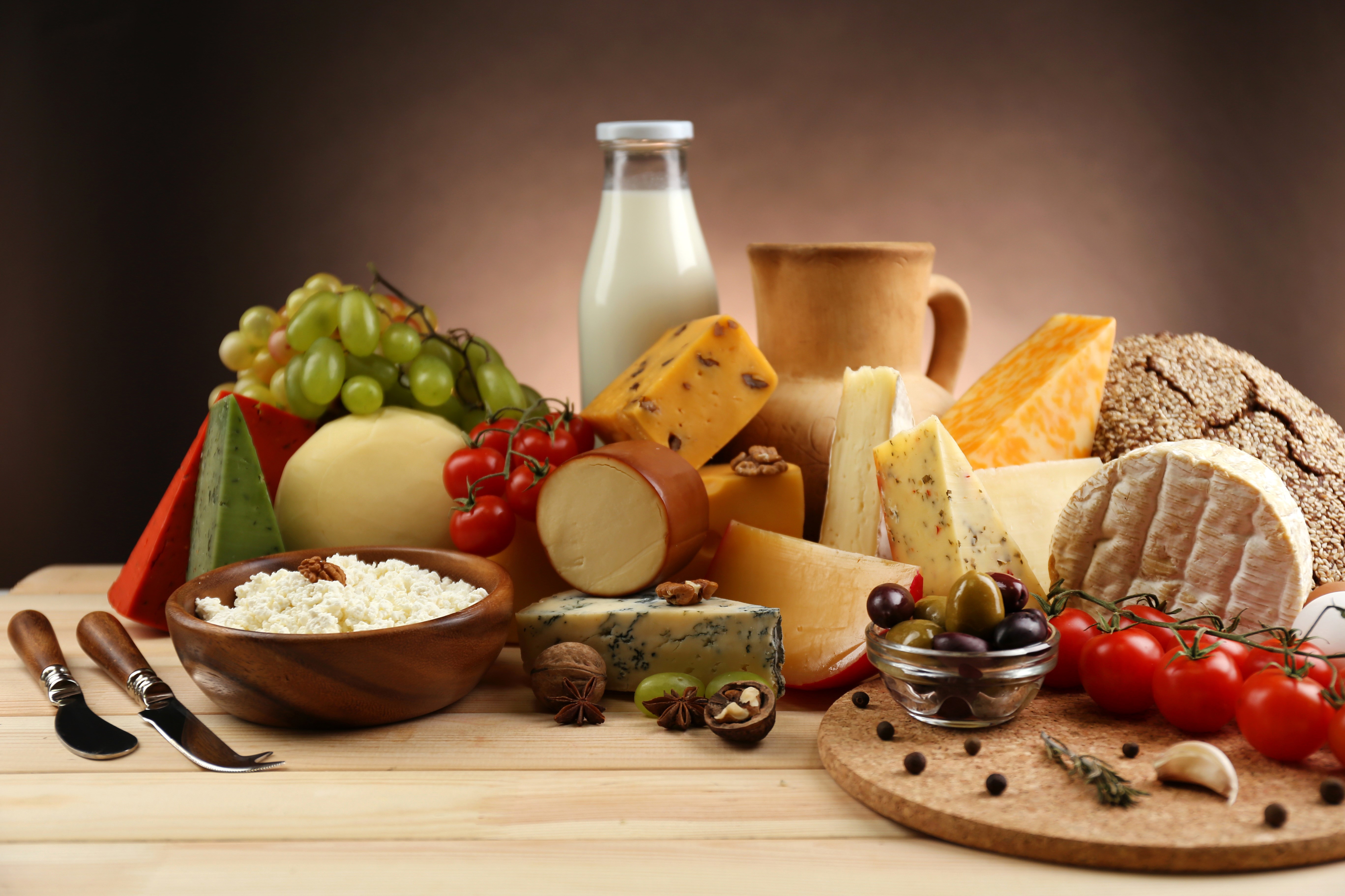 Still-life of cheese, tomatoes, milk, and grapes HD Wallpaper