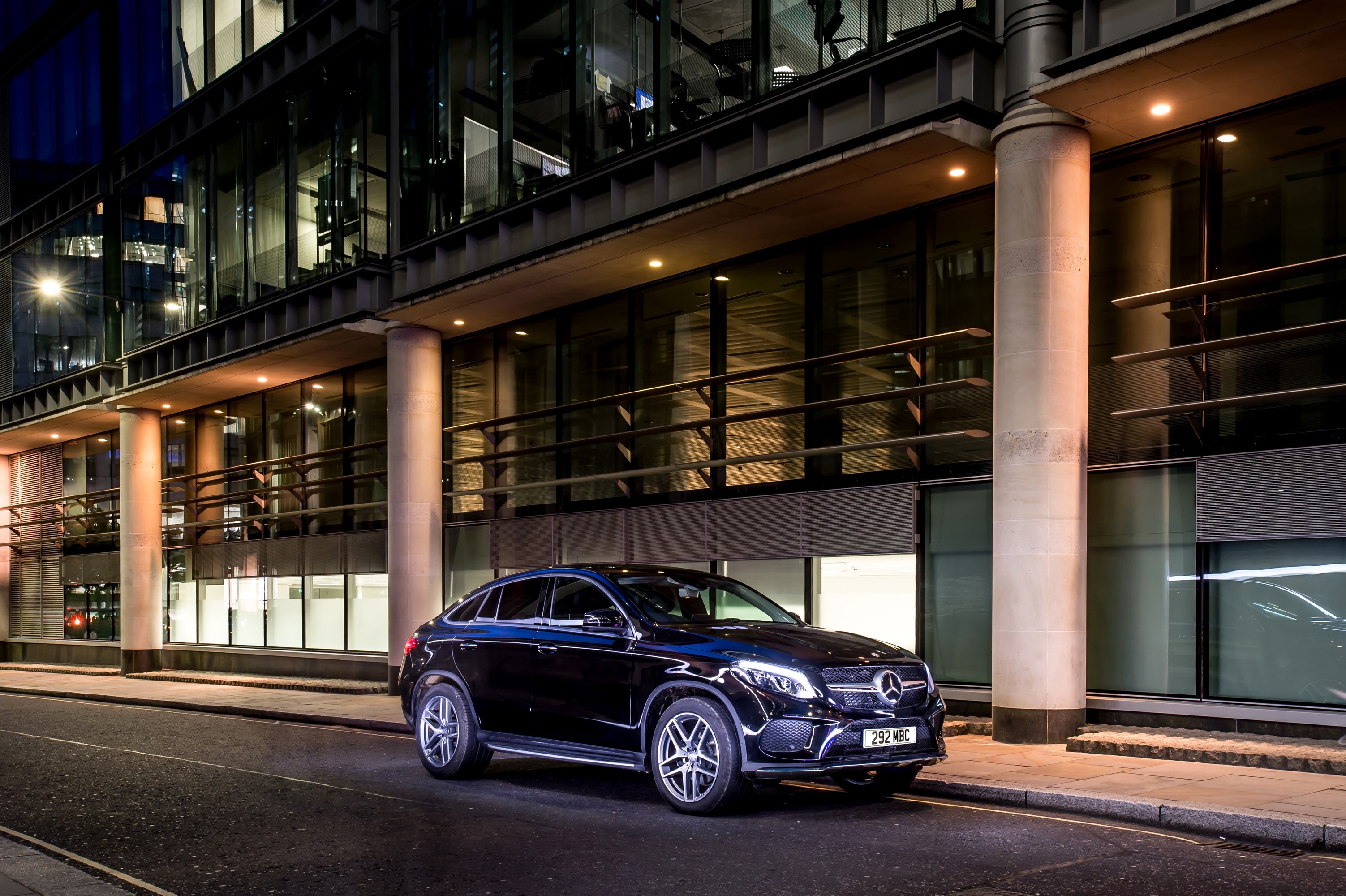 Black Mercedes-Benz GLE Coupe parked at night HD Wallpaper