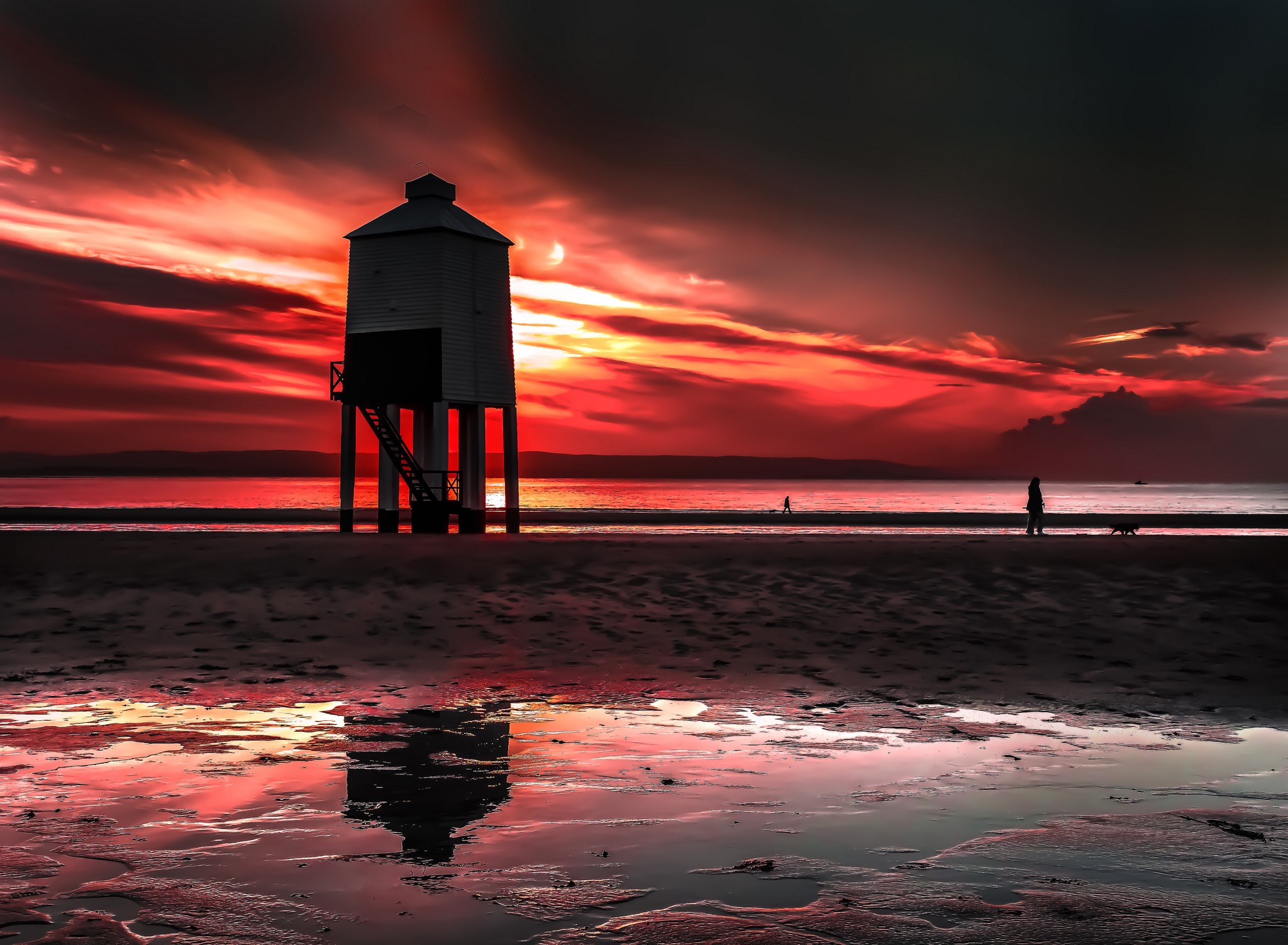 Lighthouse on beach during sunset HD Wallpaper