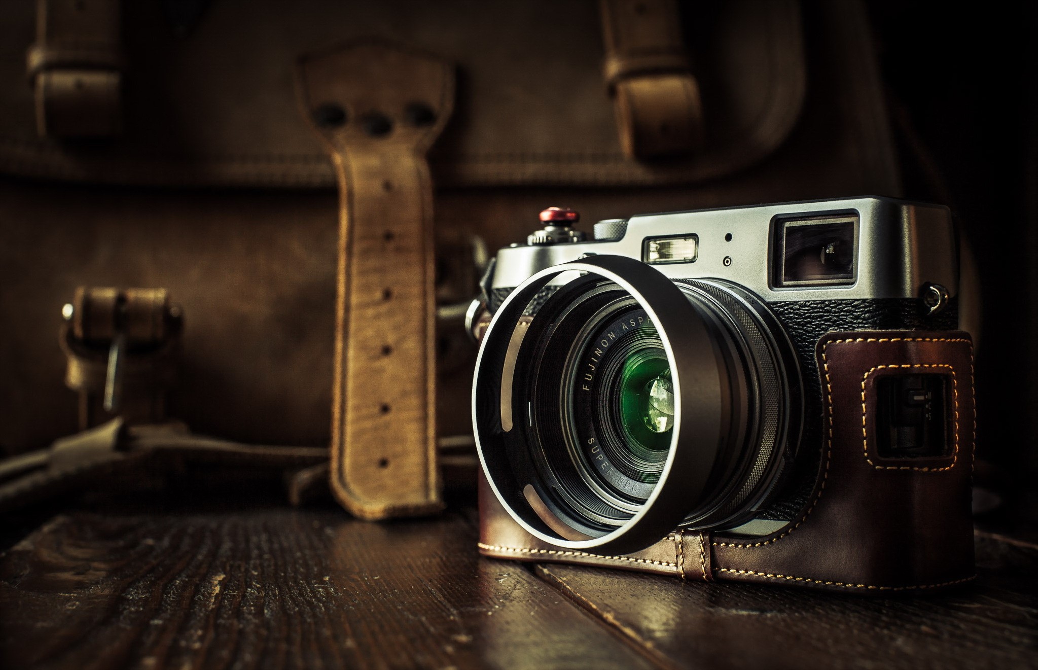 Retro Fujifilm Camera on a Wooden Table HD Wallpaper