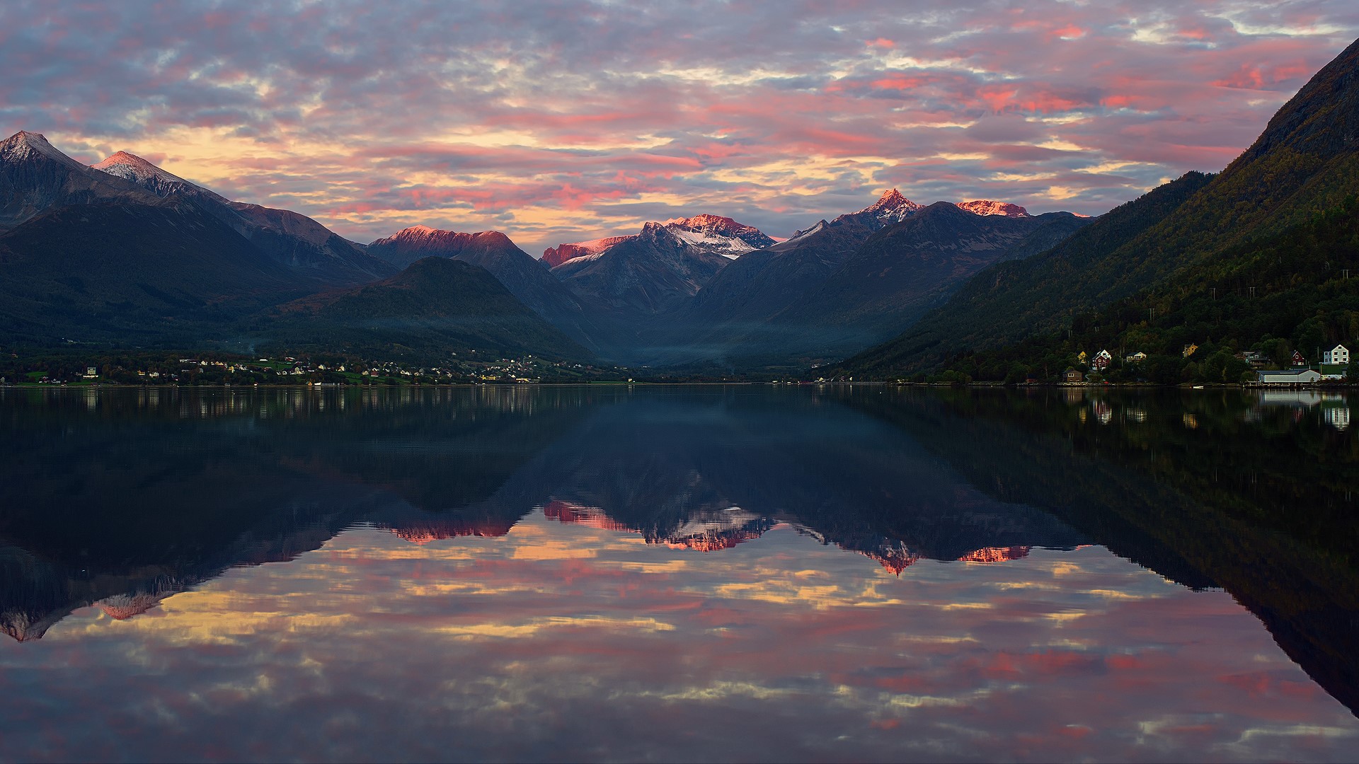 Mountains reflecting in a lake at sunset in Norway HD Wallpaper