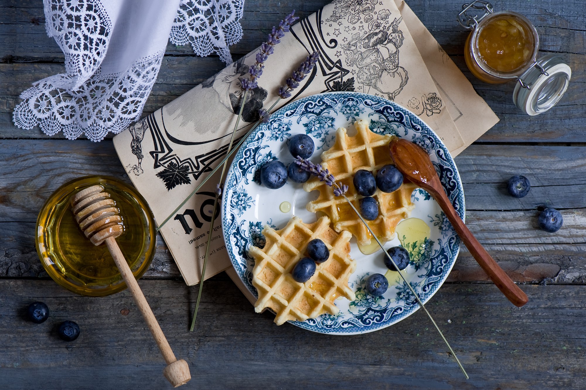 Waffles with blueberries and honey on a wooden table HD Wallpaper