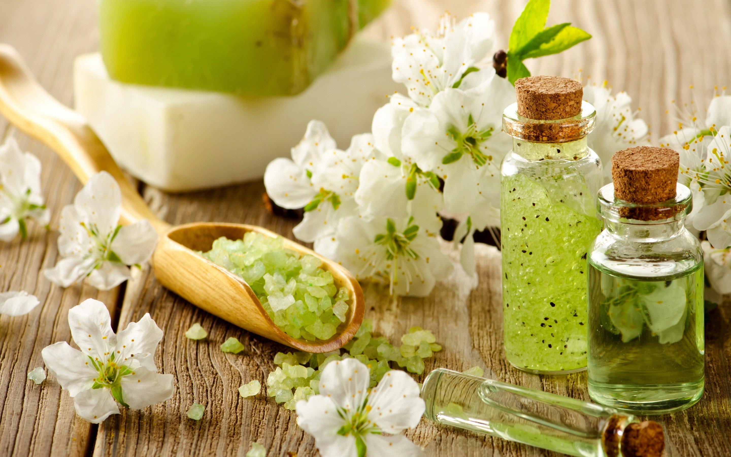 Spa products with flowers and wooden spoon HD Wallpaper