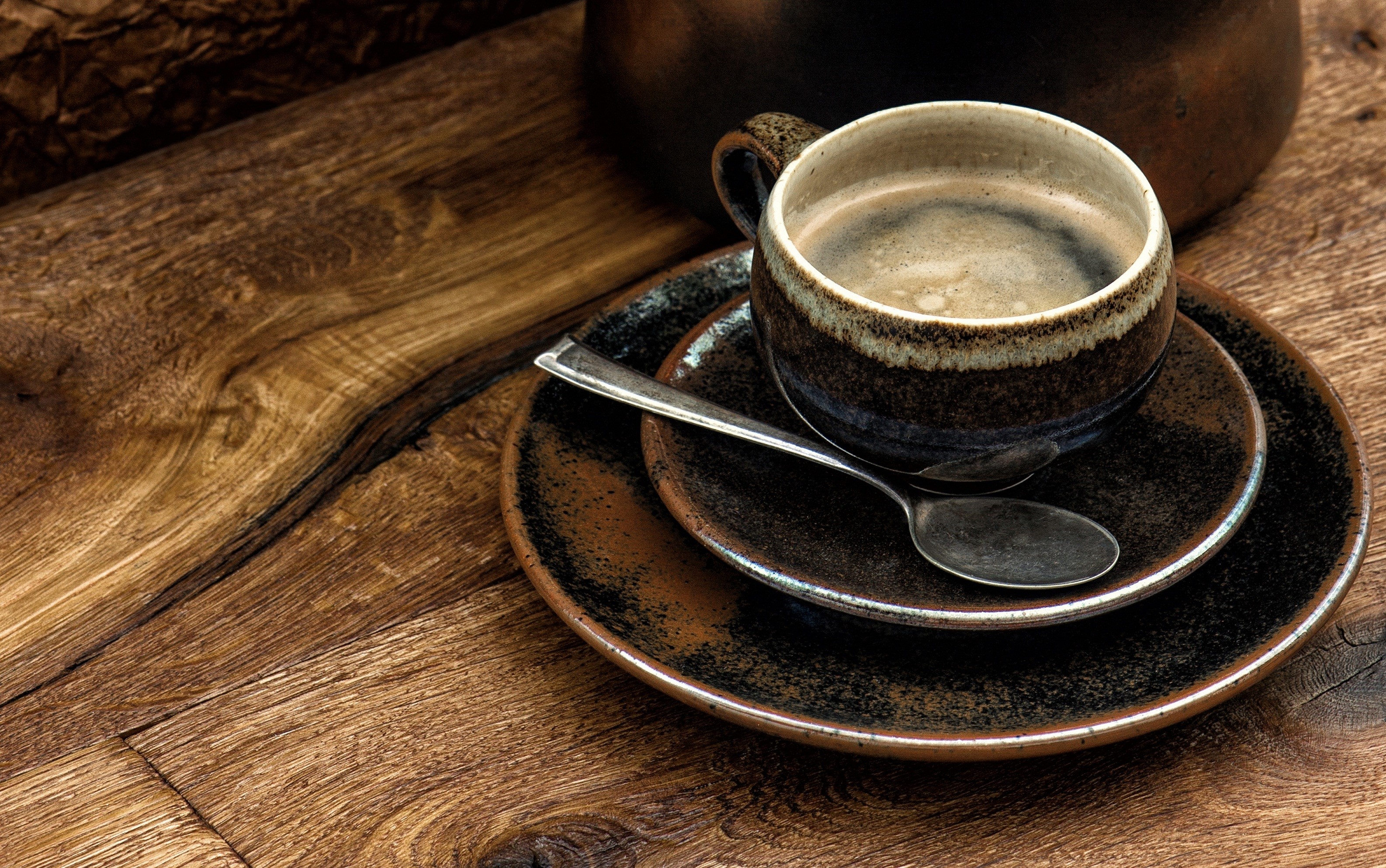 Coffee cup with spoon and saucer on wooden table HD Wallpaper