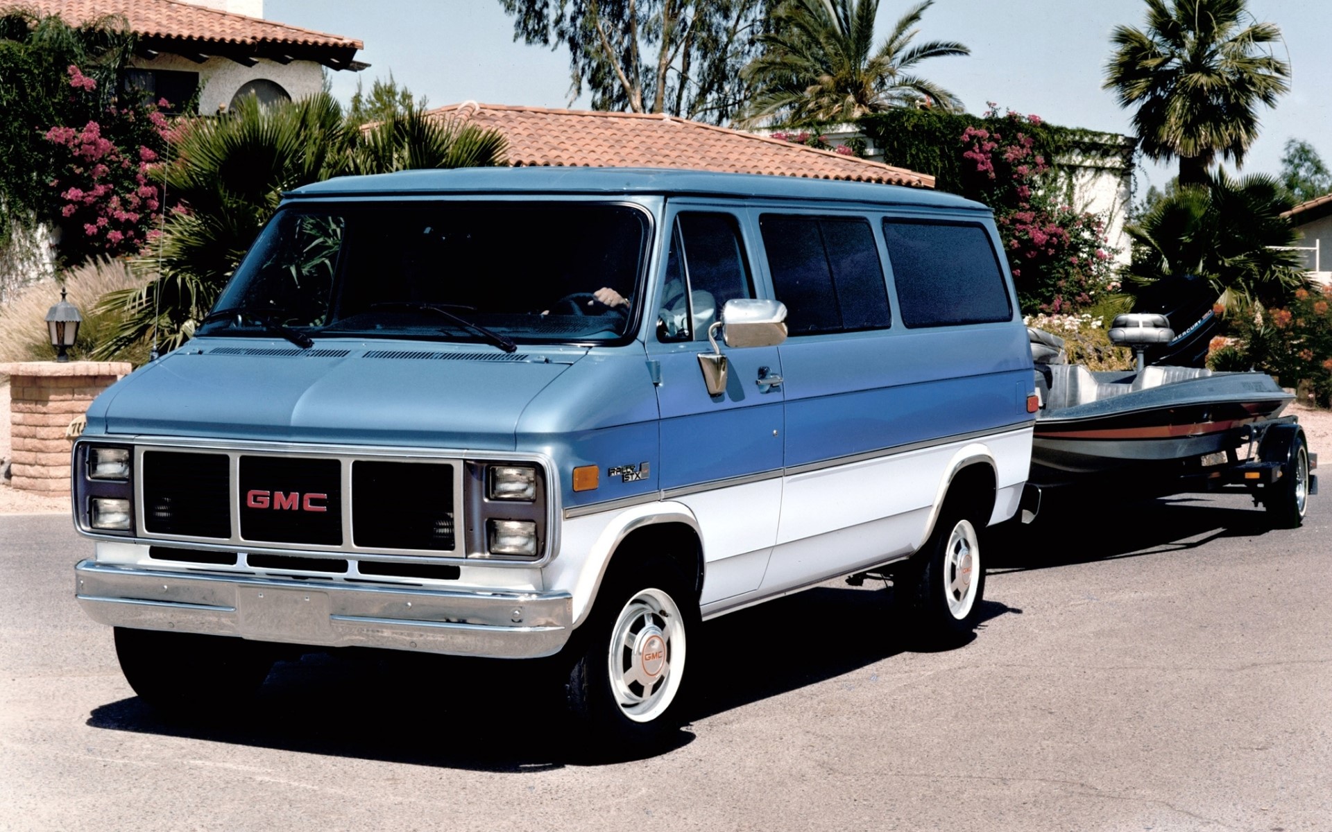 1985 GMC Vandura Rally STX towing a boat HD Wallpaper
