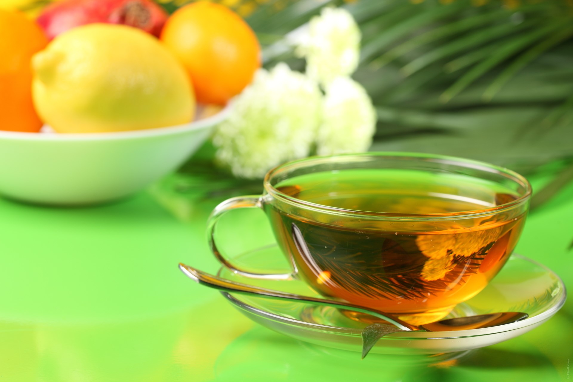 Cup of tea with fruit and flowers HD Wallpaper
