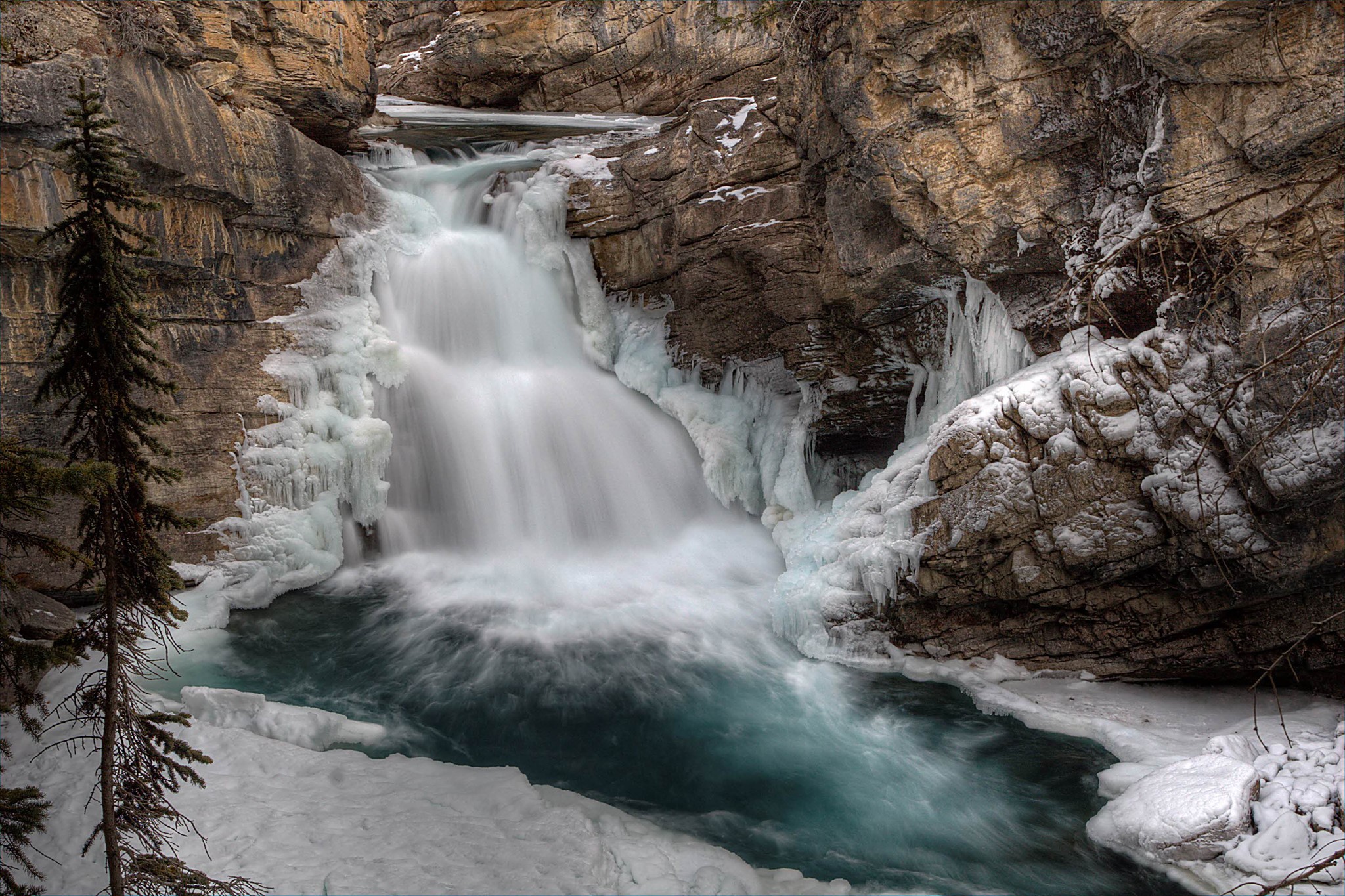 Frozen Waterfall in a Rocky Canyon HD Wallpaper