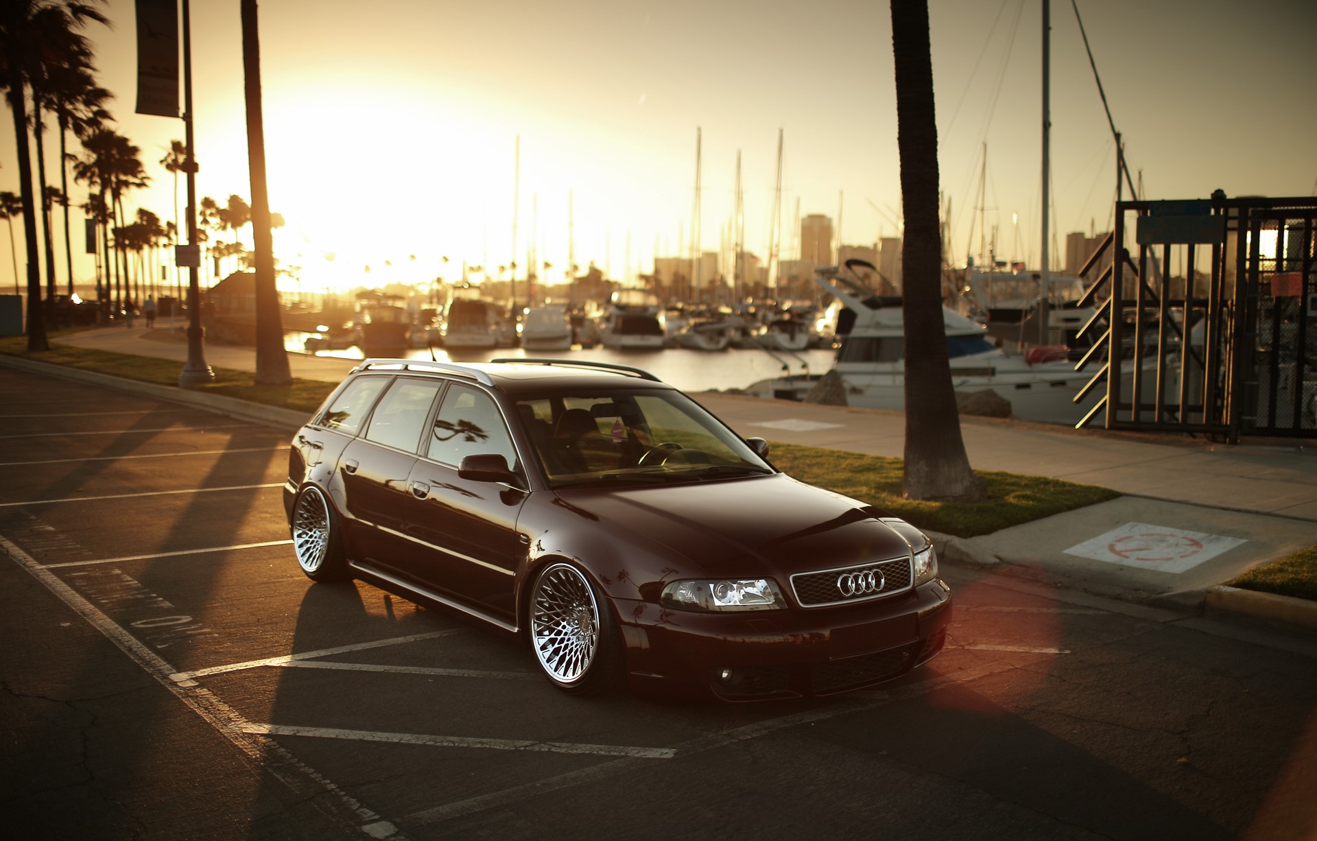 Audi RS4 Avant Wagon parked by a marina at sunset HD Wallpaper