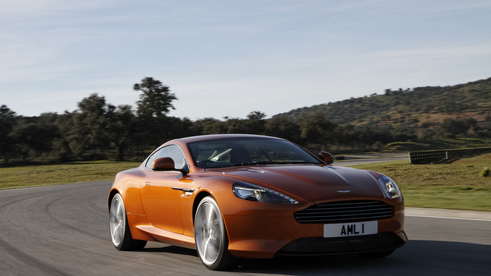 Aston Martin Virage on a Racetrack HD Wallpaper
