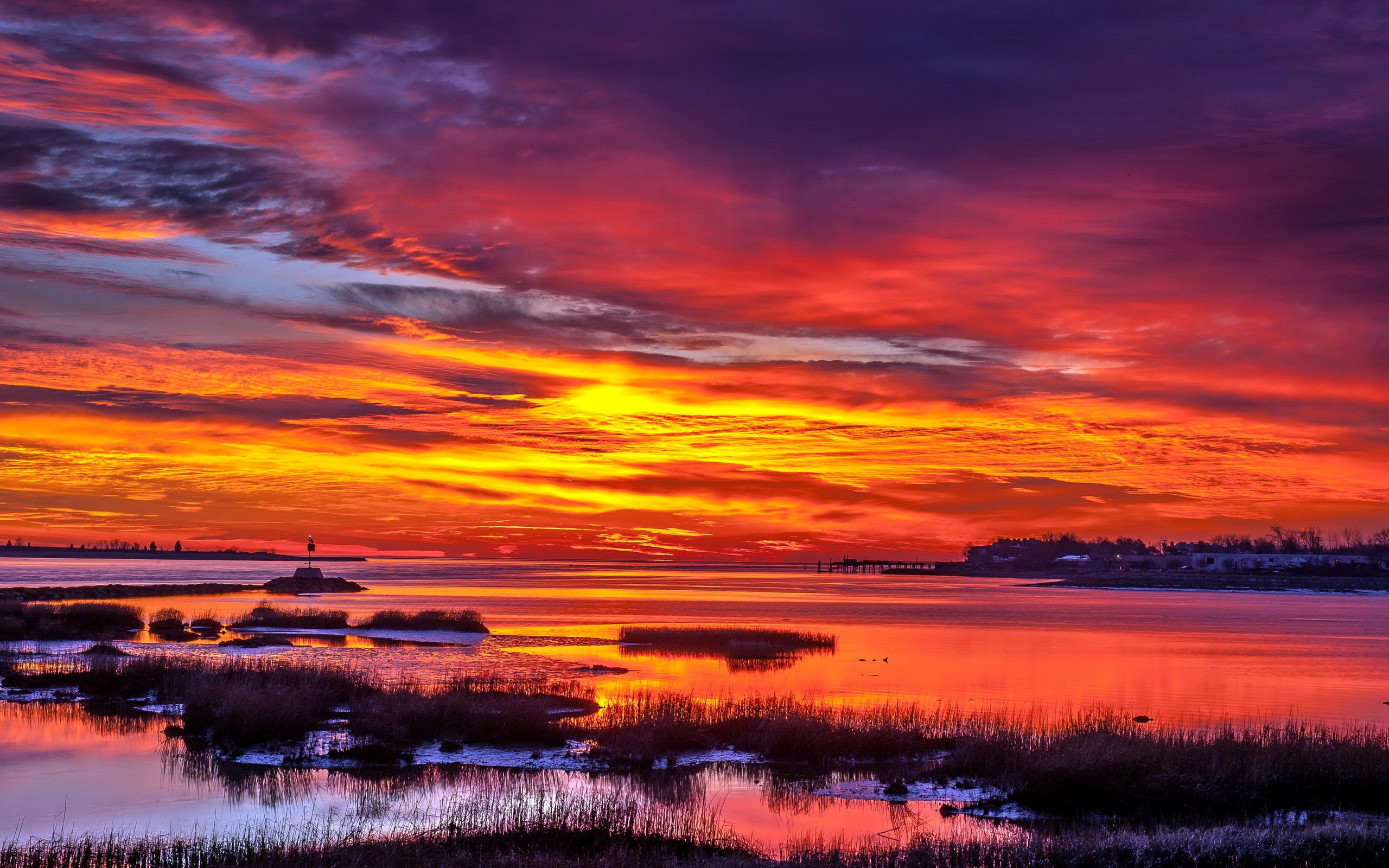 Vibrant Sunset Over Water with Lighthouse HD Wallpaper