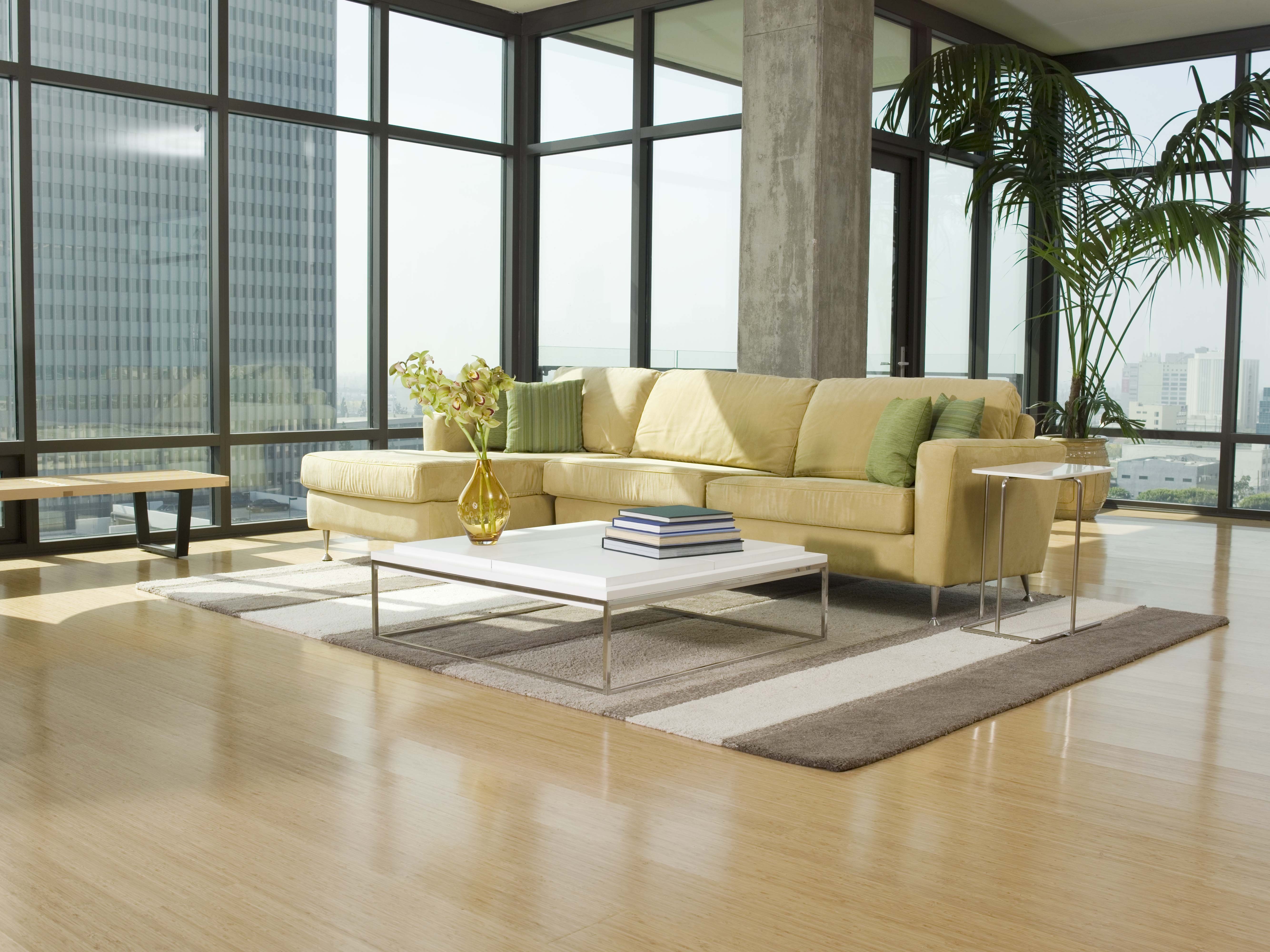 Modern living room with large windows and city view HD Wallpaper