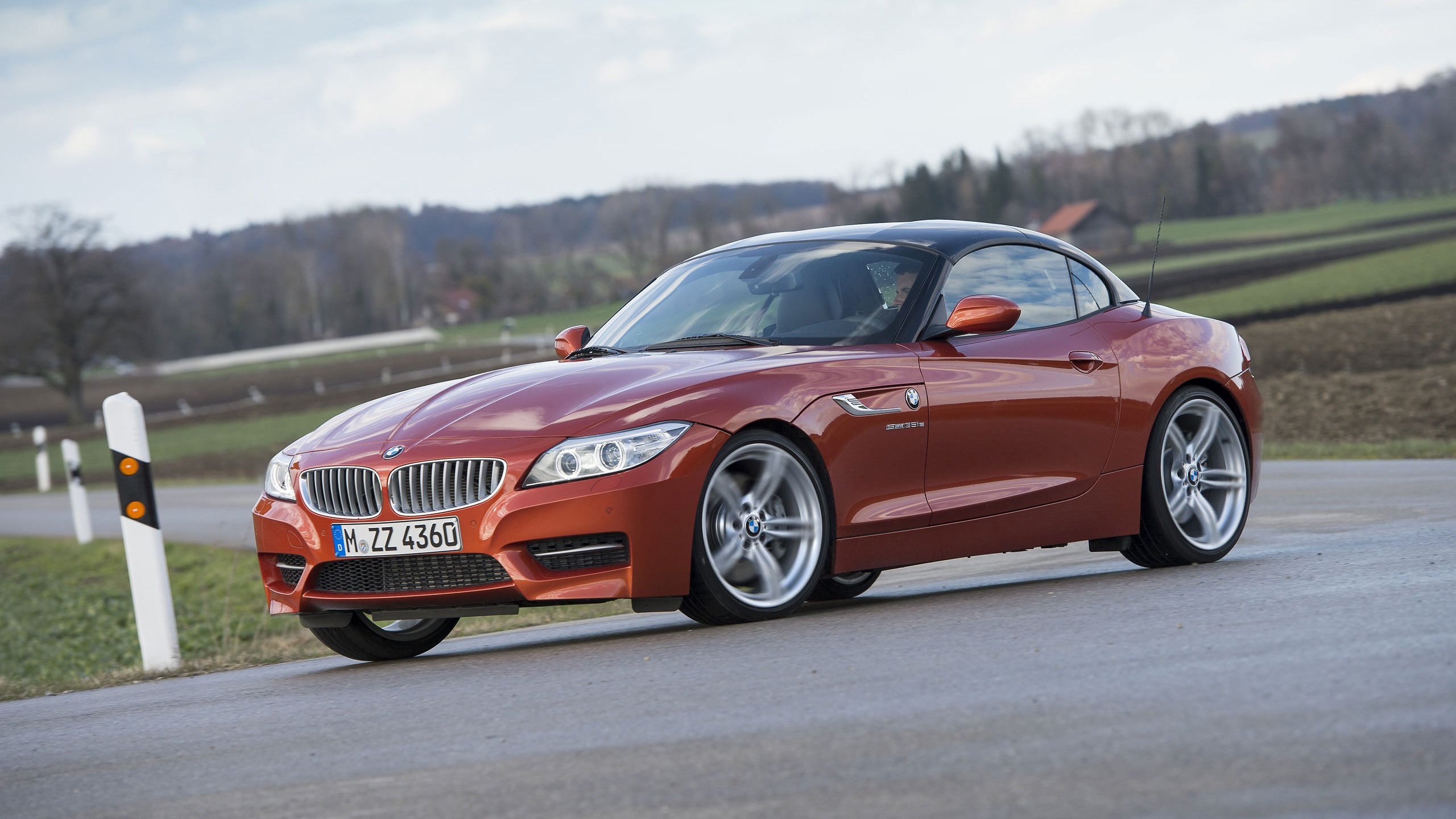 Orange BMW Z4 sDrive35is on a Road HD Wallpaper