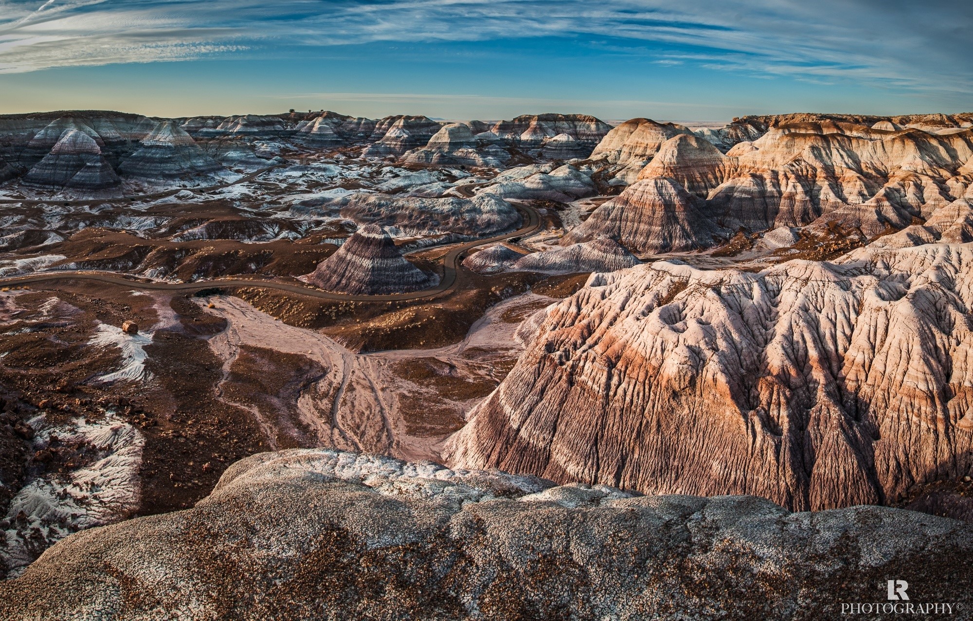 Painted Desert Landscape with Winding Road HD Wallpaper