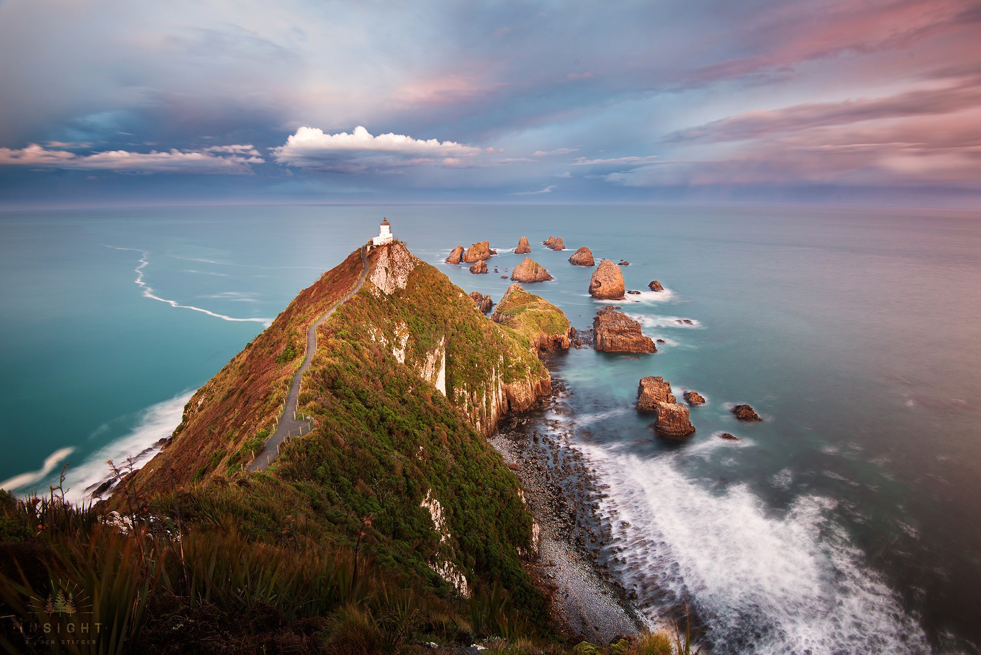 Nugget Point Lighthouse and sea stacks, New Zealand HD Wallpaper