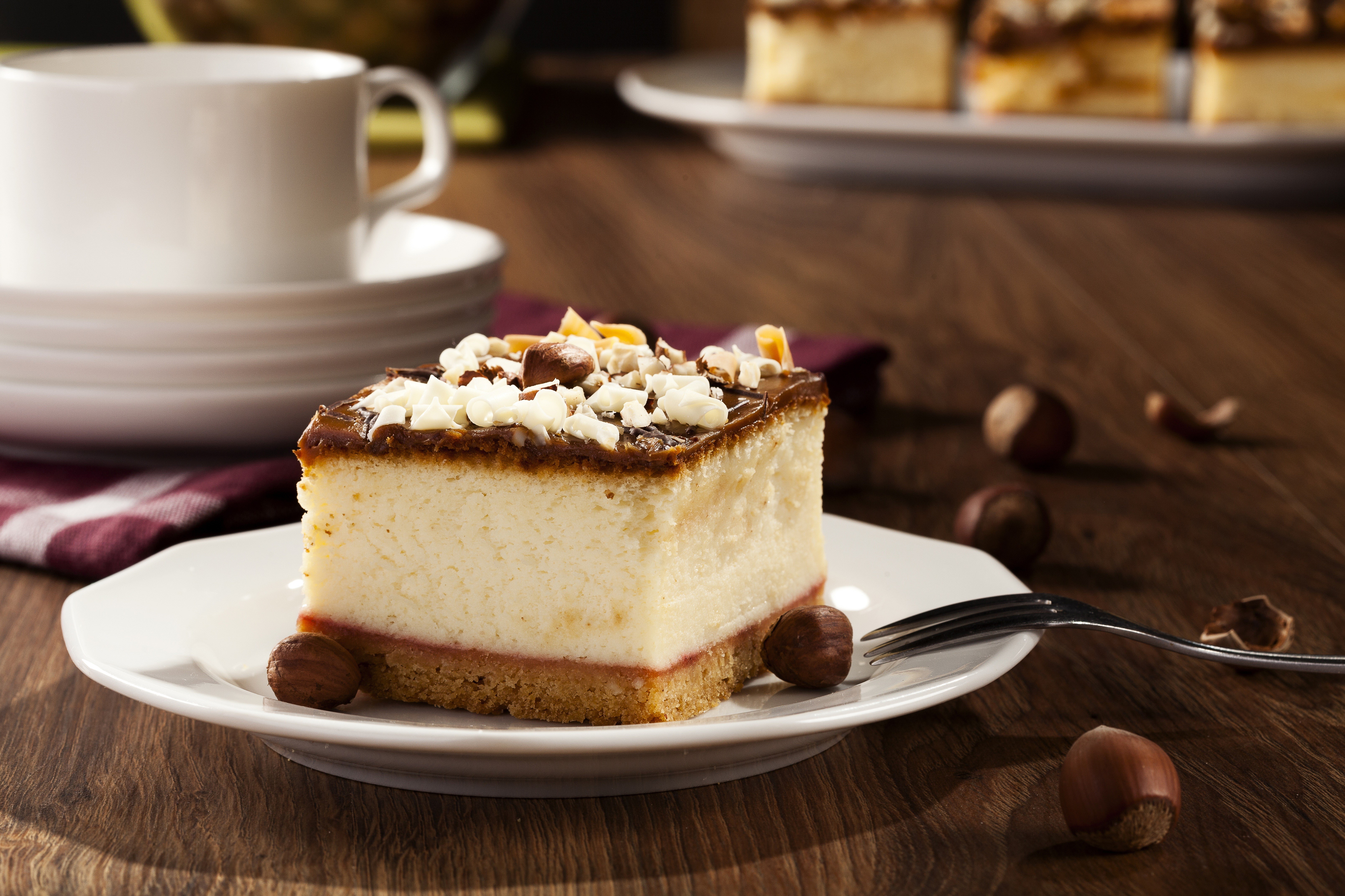 Slice of cheesecake with chocolate and nuts HD Wallpaper