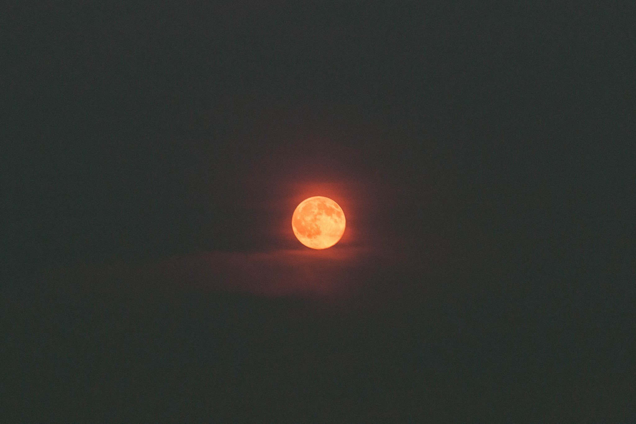 Red and orange moon in dark sky HD Wallpaper