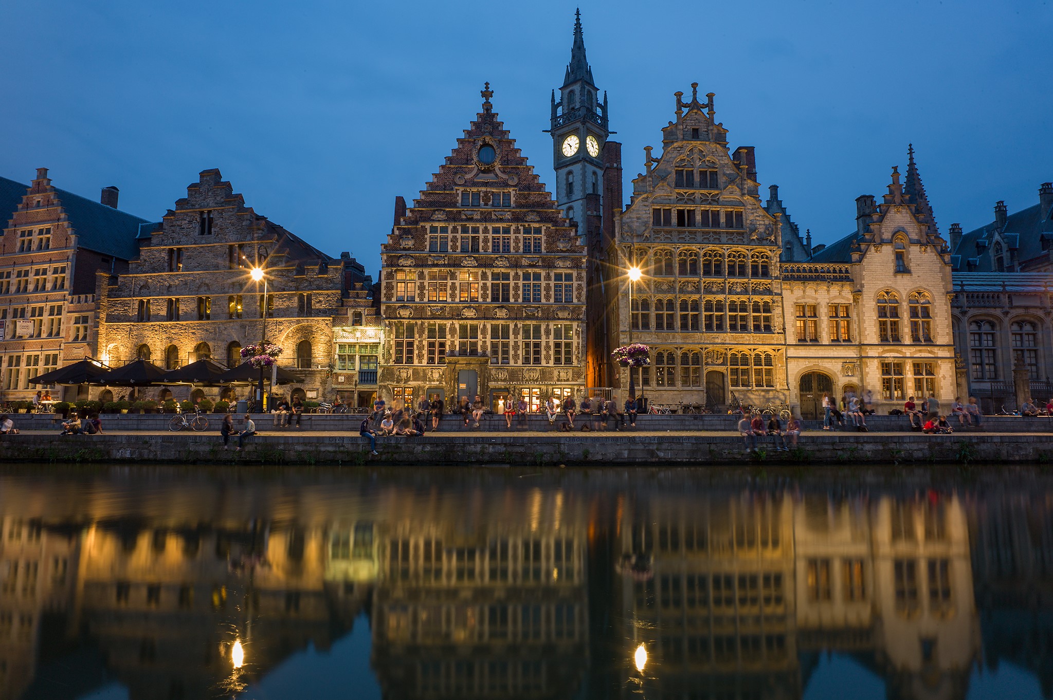 Ghent, Belgium: Historic buildings reflected in a river at night HD Wallpaper