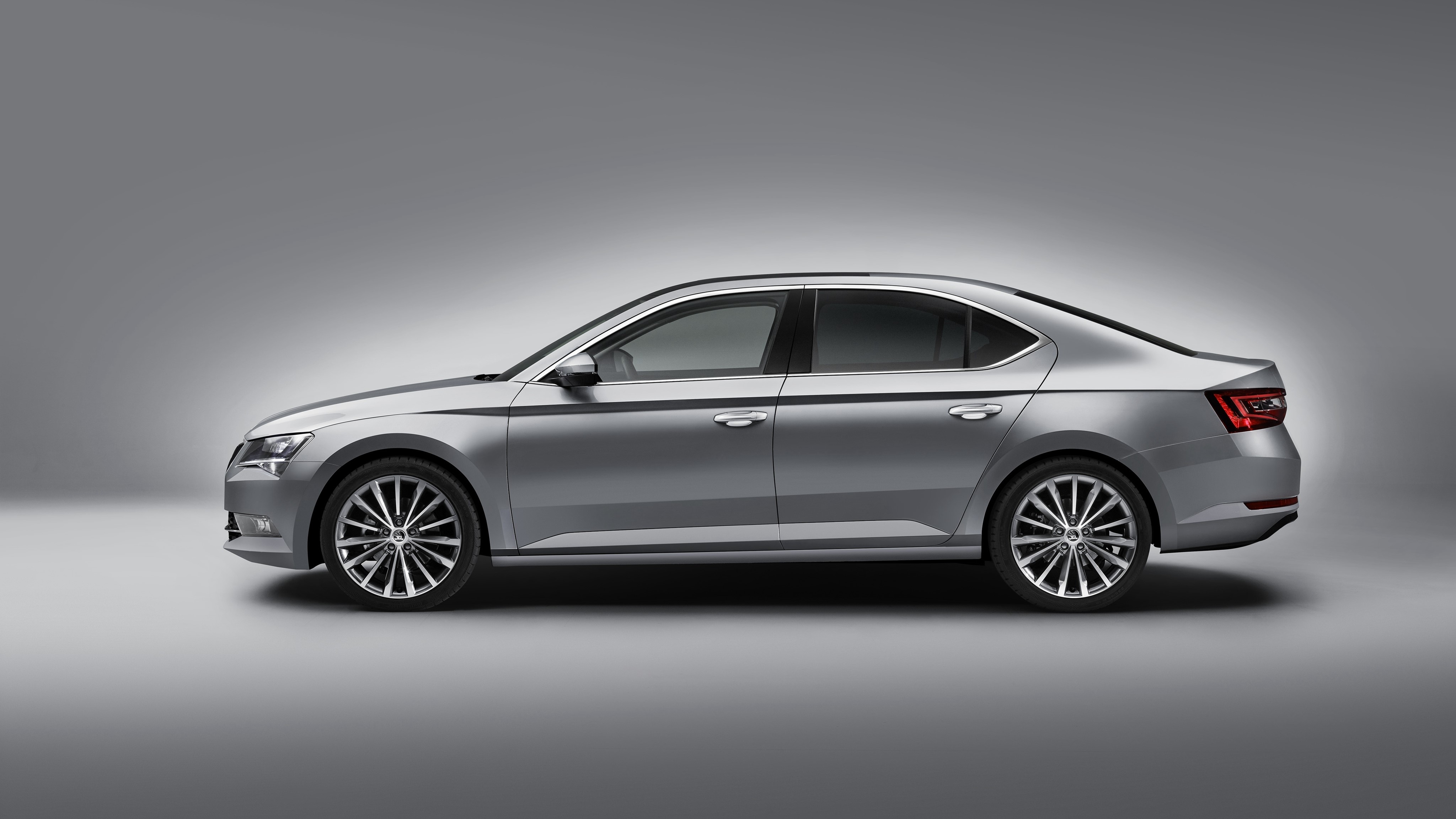 Silver Skoda Superb Sedan from the side HD Wallpaper