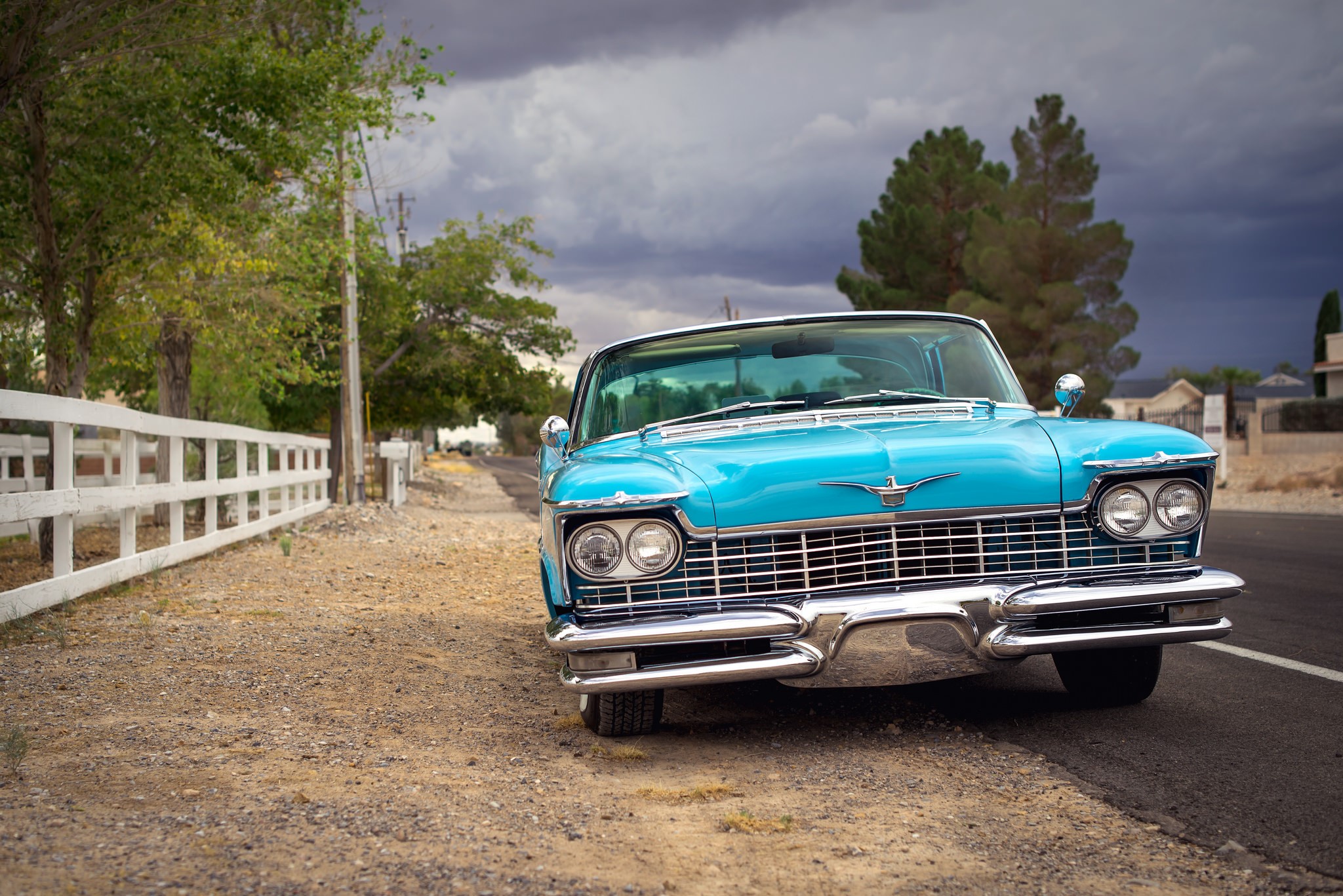 1957 Chrysler Imperial parked on a dirt road HD Wallpaper