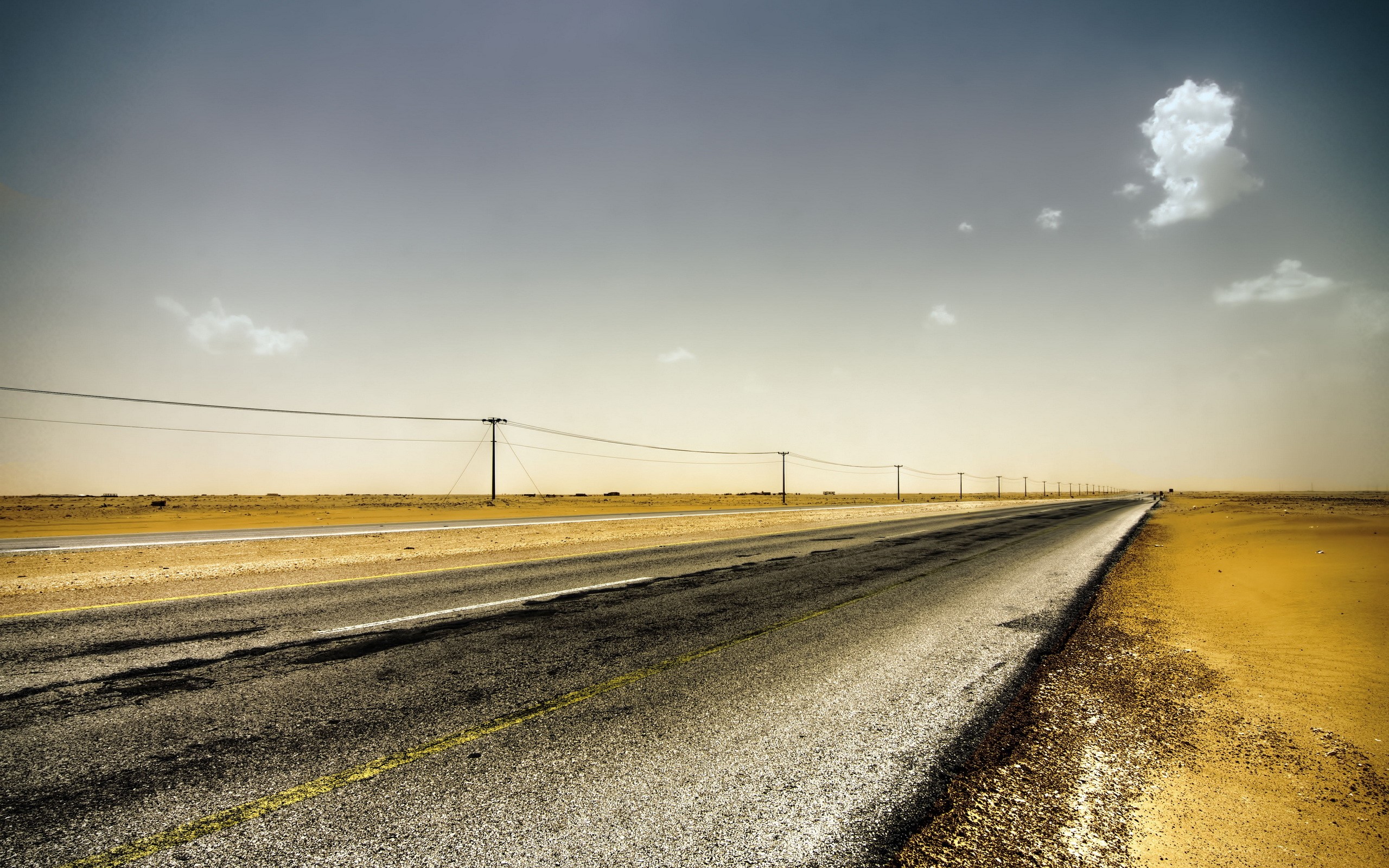 Desert Road with Telephone Poles and Sky HD Wallpaper