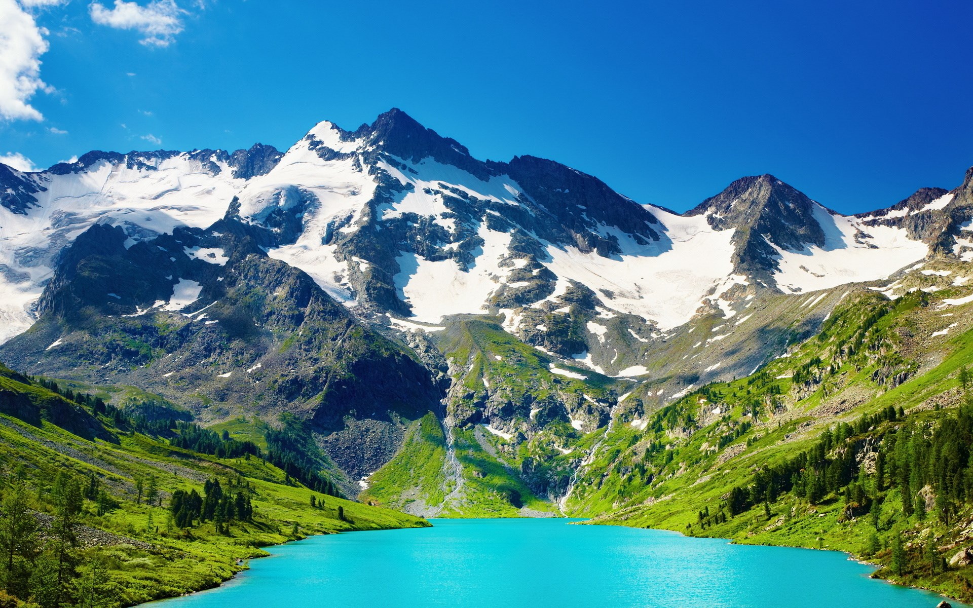 Turquoise lake and snow-capped mountains under blue sky HD Wallpaper