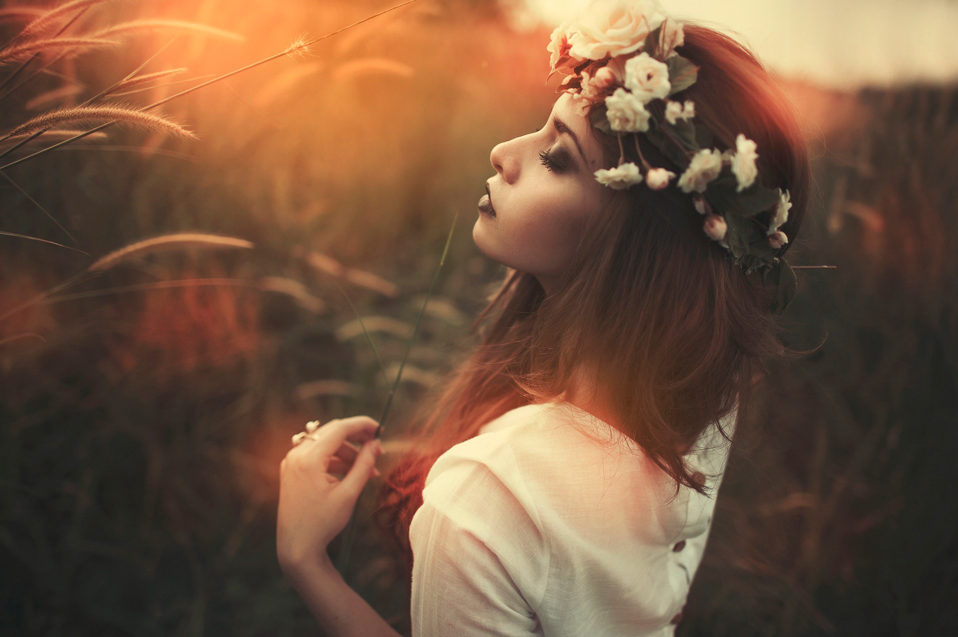 Woman with flower crown in a field HD Wallpaper