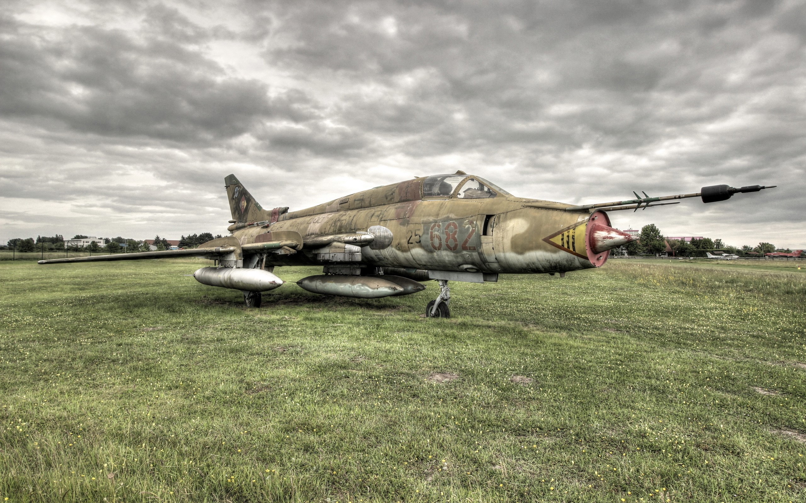 Old Mig II airplane on grass field HD Wallpaper