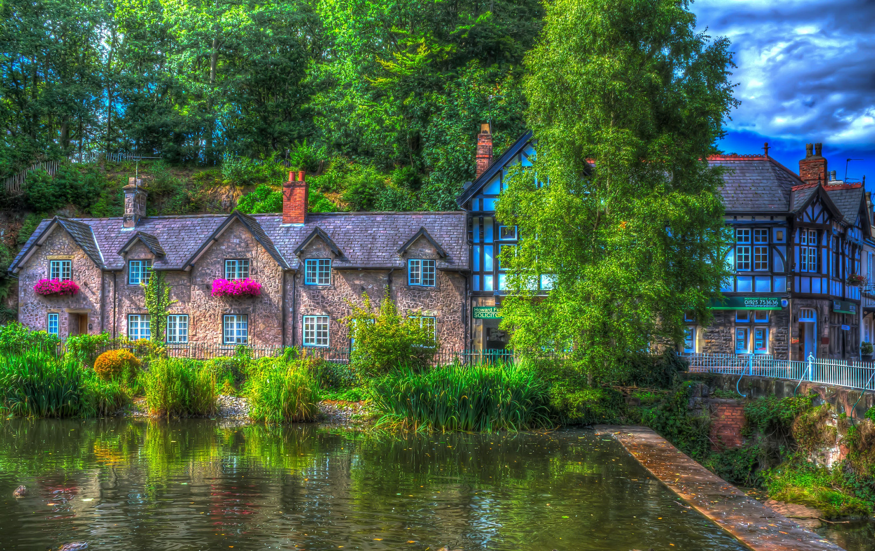 Stone houses by a pond in Lymm, England HD Wallpaper