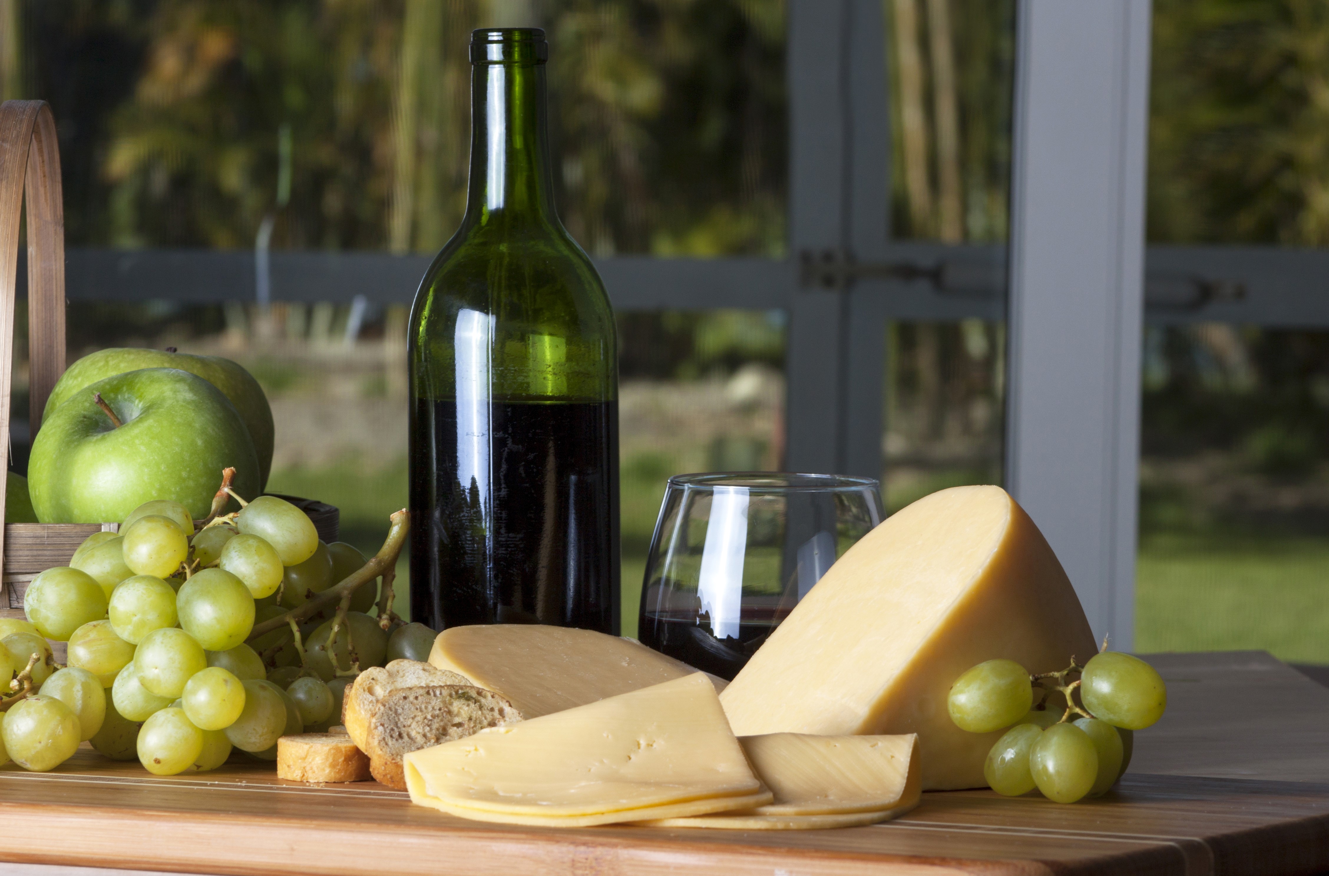 Still-life of cheese, wine, grapes, and apples HD Wallpaper