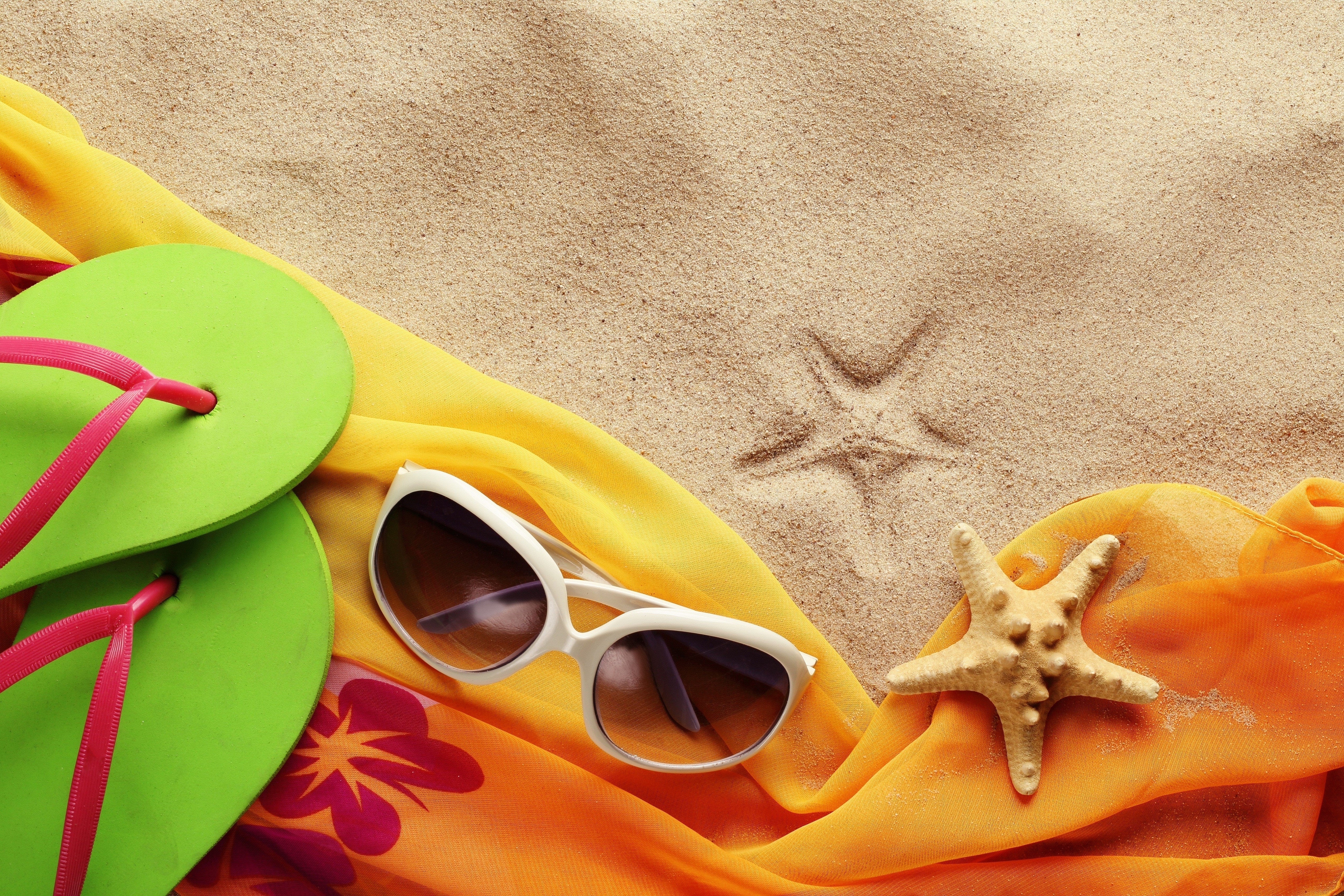 Summer beach scene with flip-flops, sunglasses, and starfish HD Wallpaper