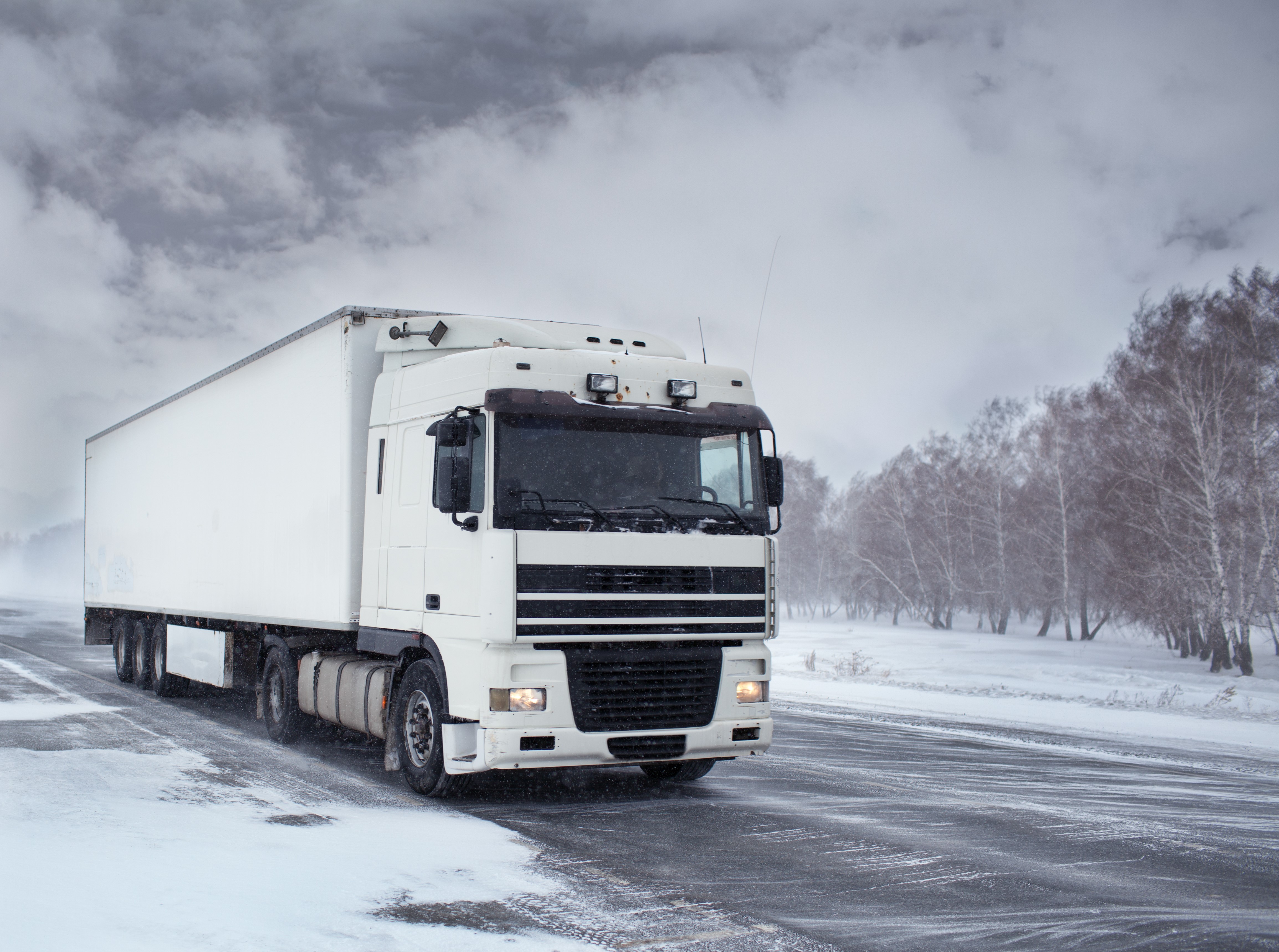 White Truck Driving on Snowy Road HD Wallpaper