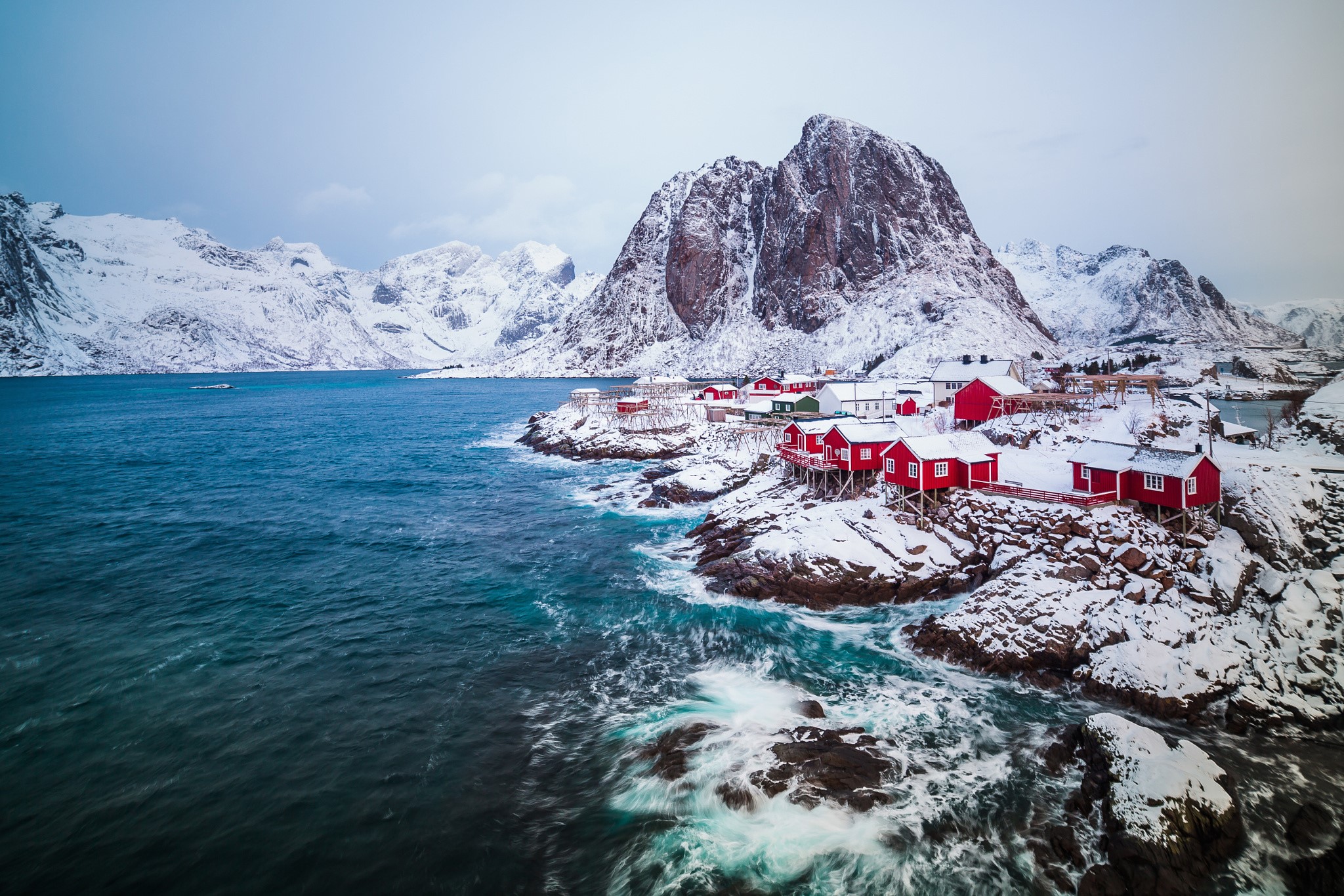 Red houses on snowy coast of Lofoten, Norway HD Wallpaper