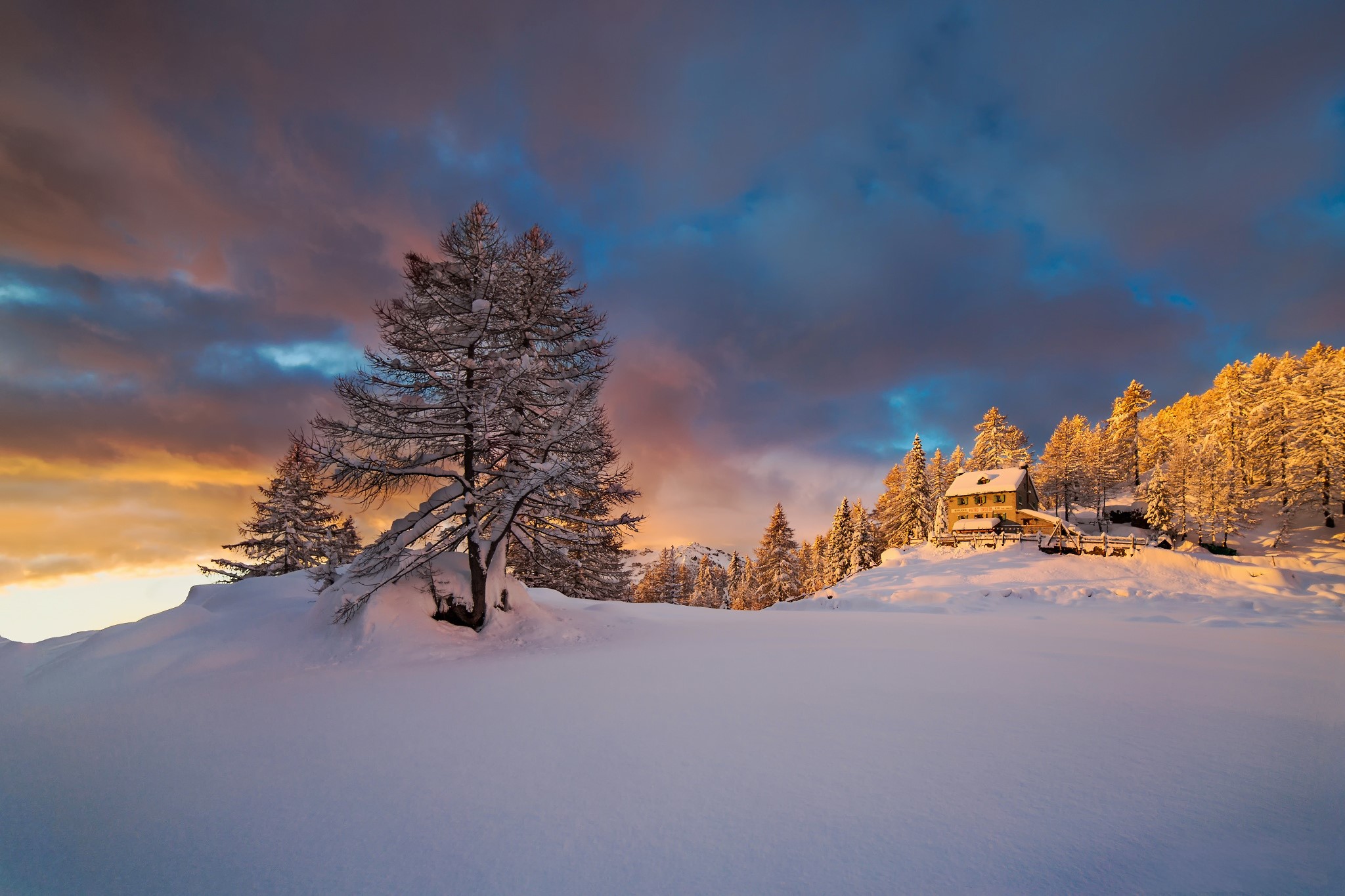 Winter sunset over the Alps in Italy HD Wallpaper