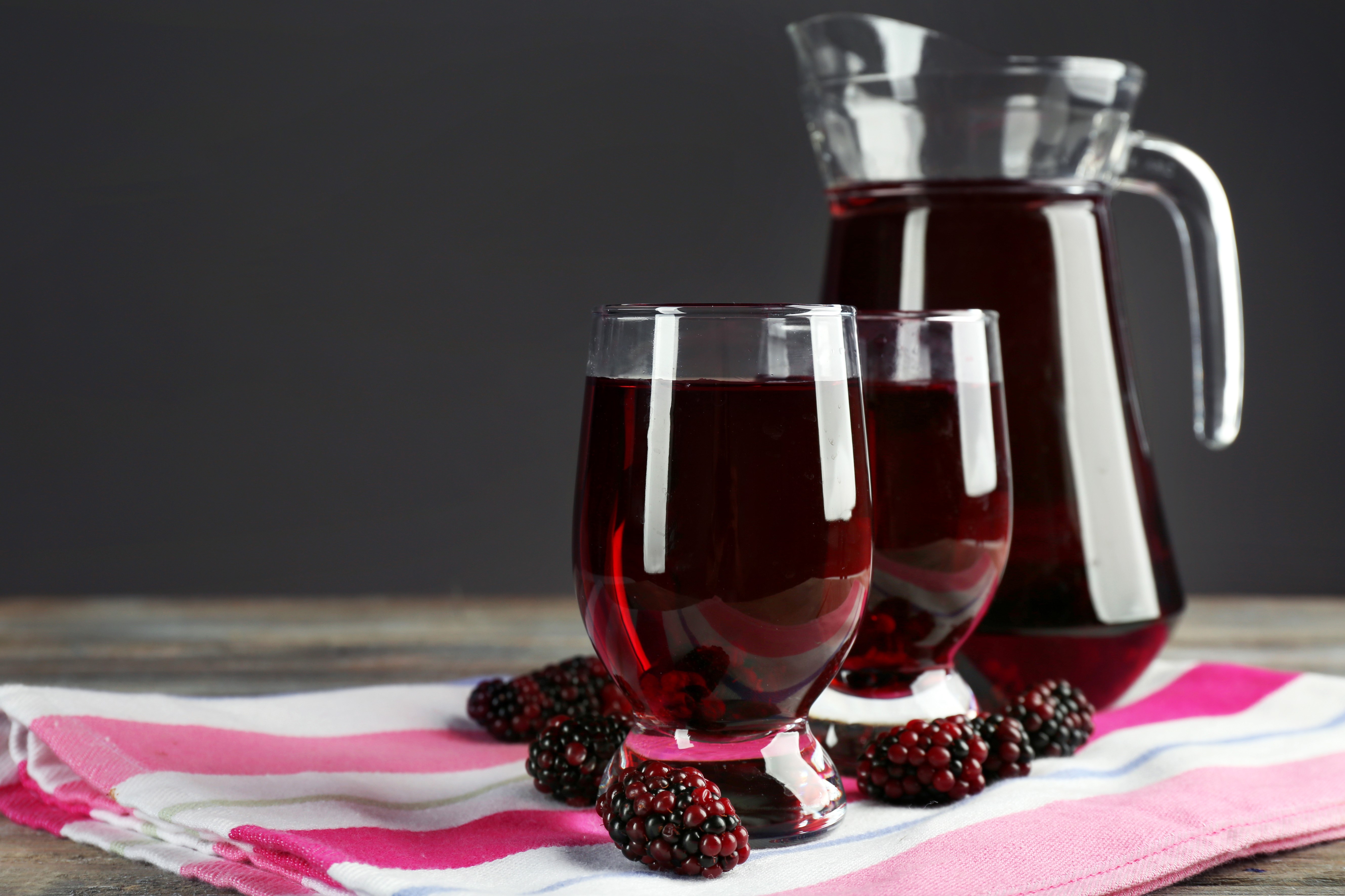 Blackberry juice in glasses and jug with blackberries HD Wallpaper