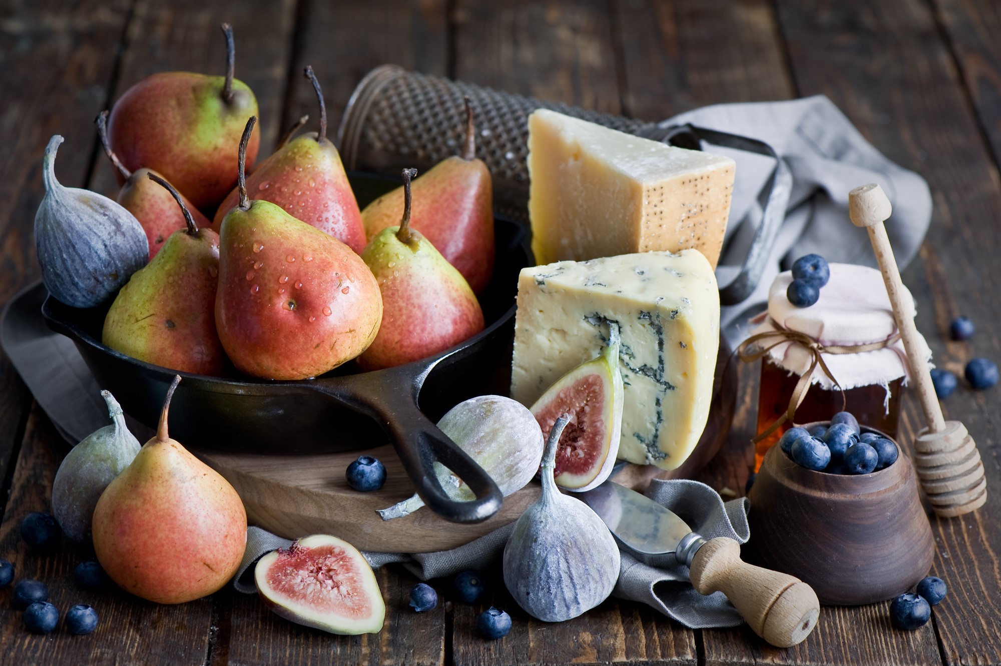 Still-life with pears, figs, cheese, blueberries, and honey HD Wallpaper