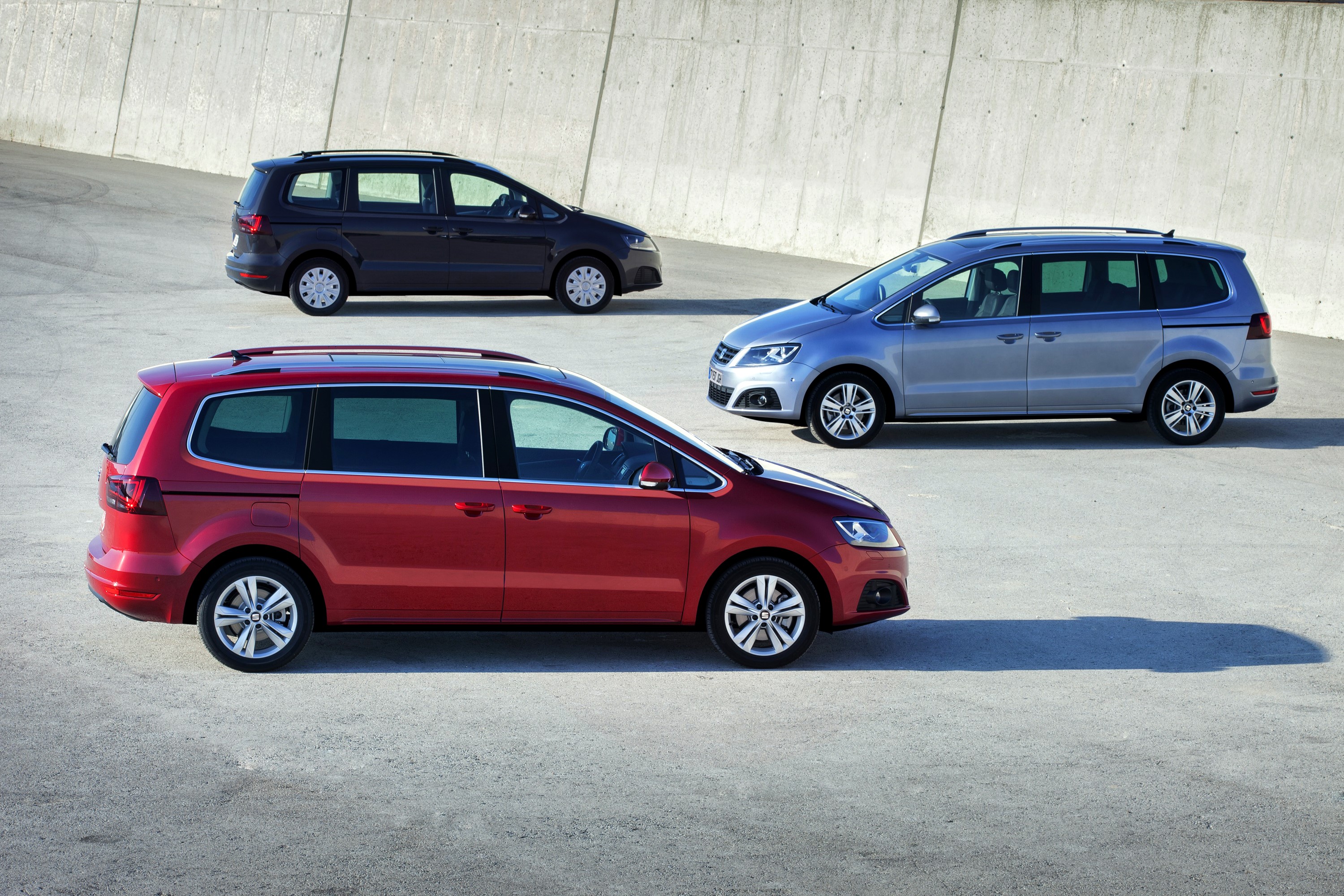 Three Seat Alhambra MPVs in a Parking Lot HD Wallpaper