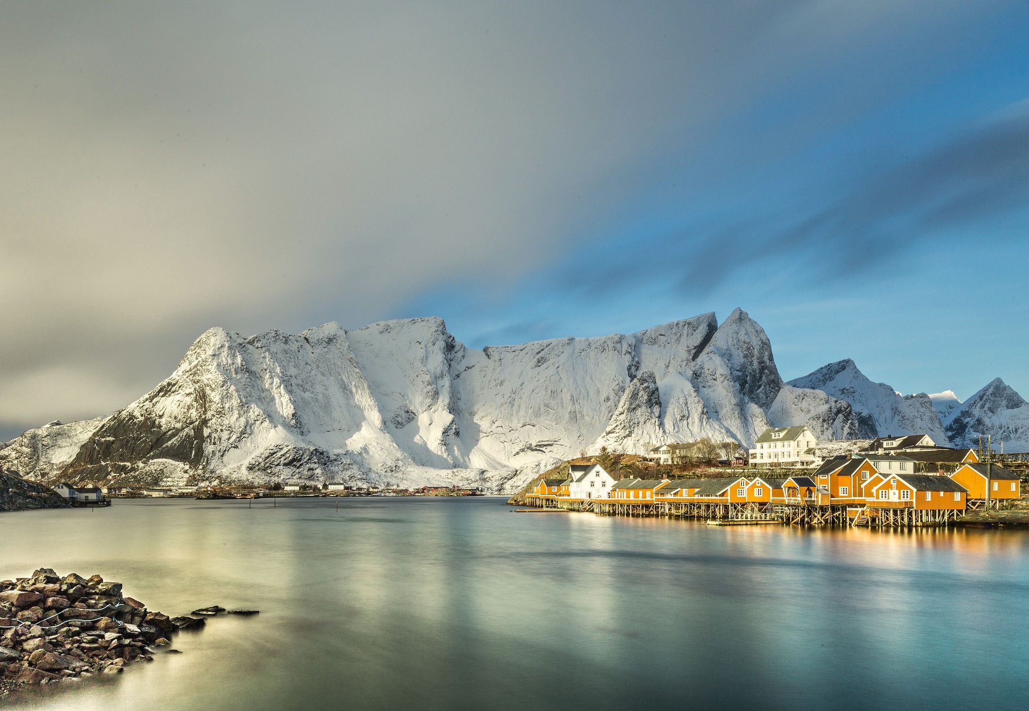 Snowy Mountains over a Coastal Village in Norway HD Wallpaper