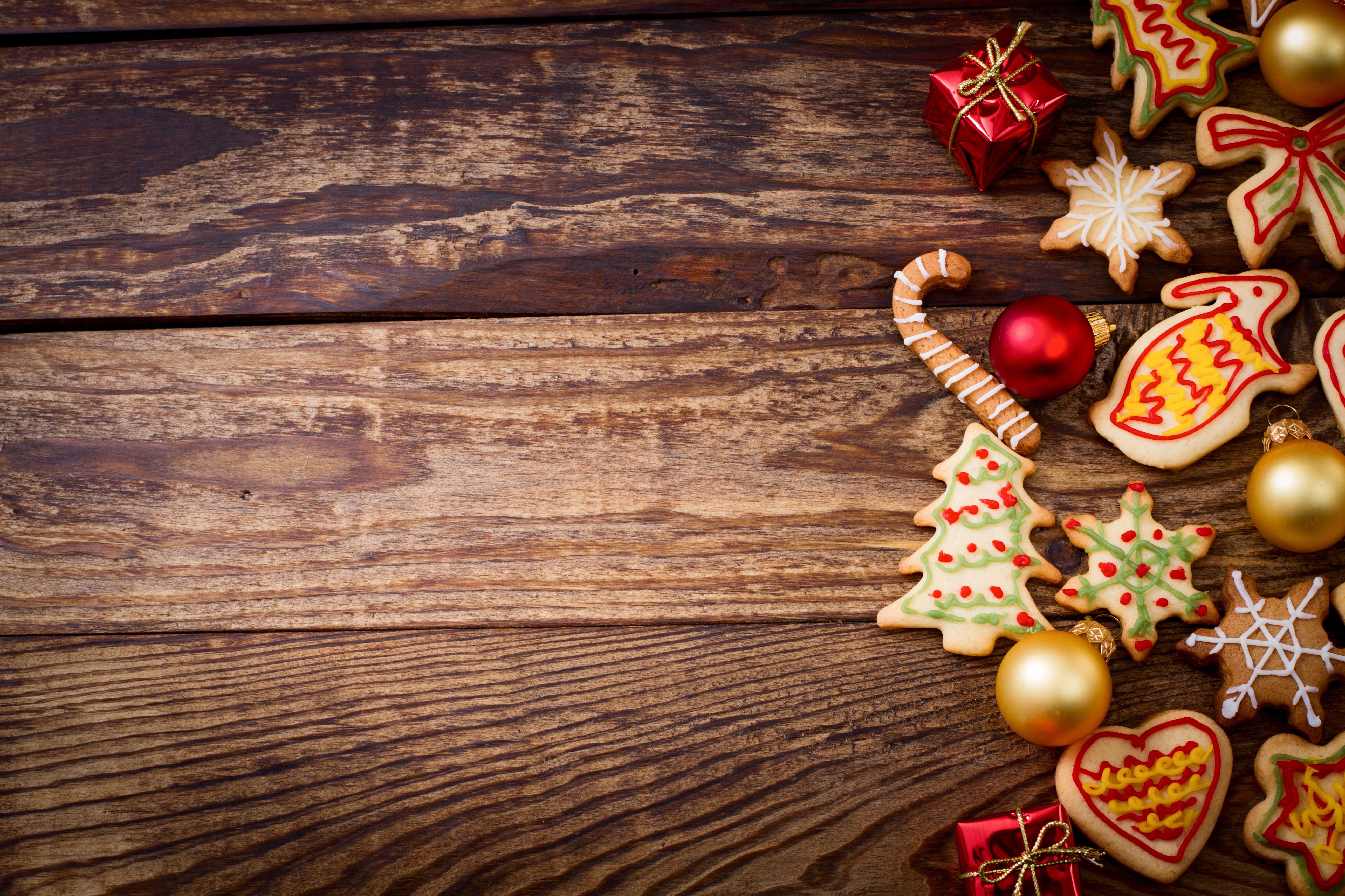 Christmas cookies and ornaments on wood planks HD Wallpaper